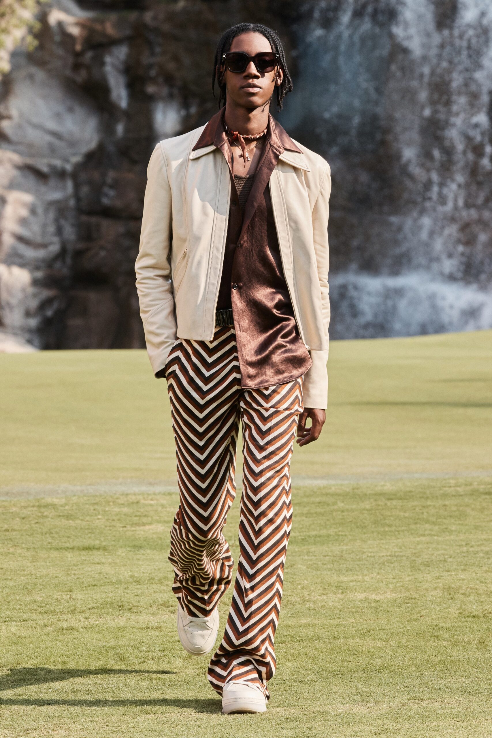 beige leather fitted jacket with brown silk shirt