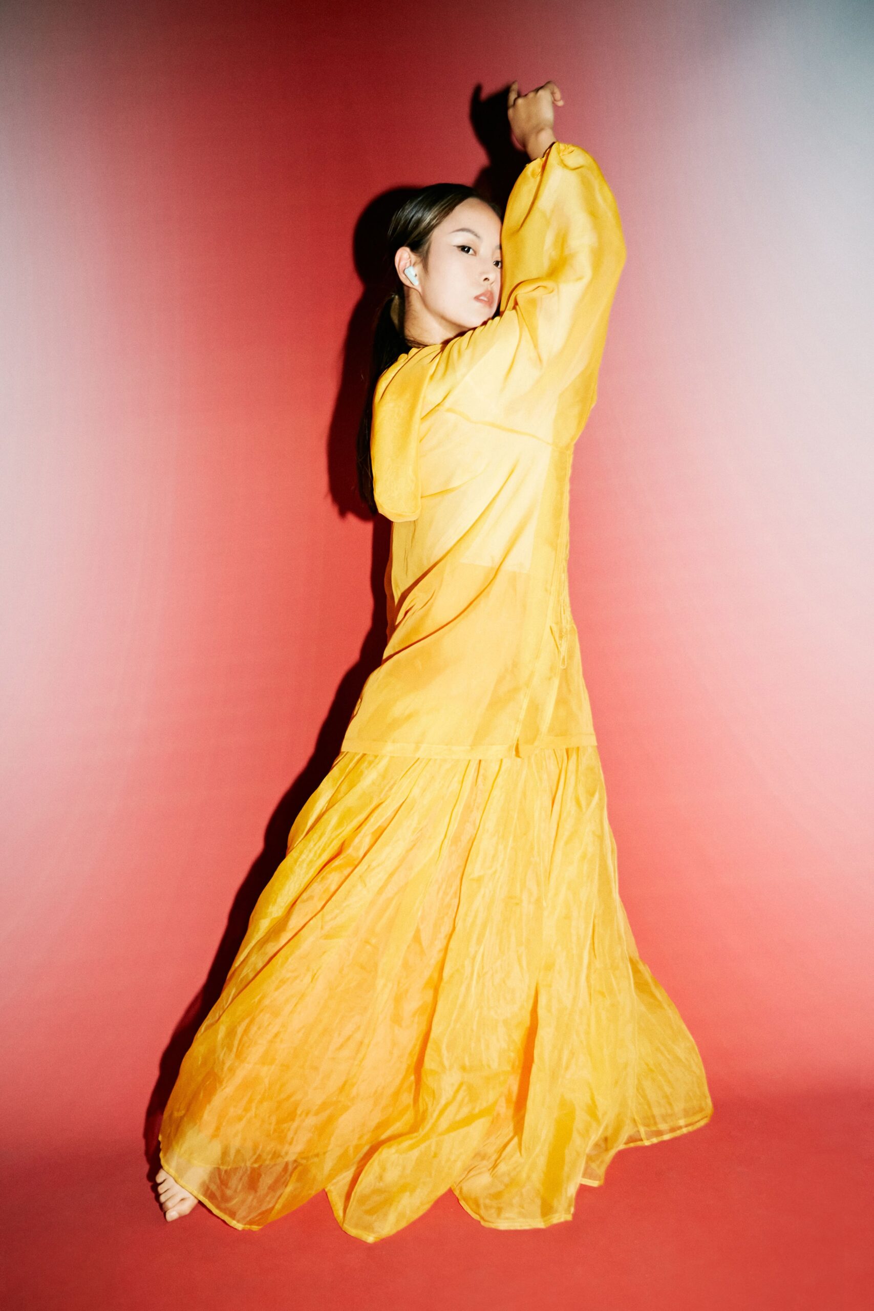 yellow flowing hooded maxi dress