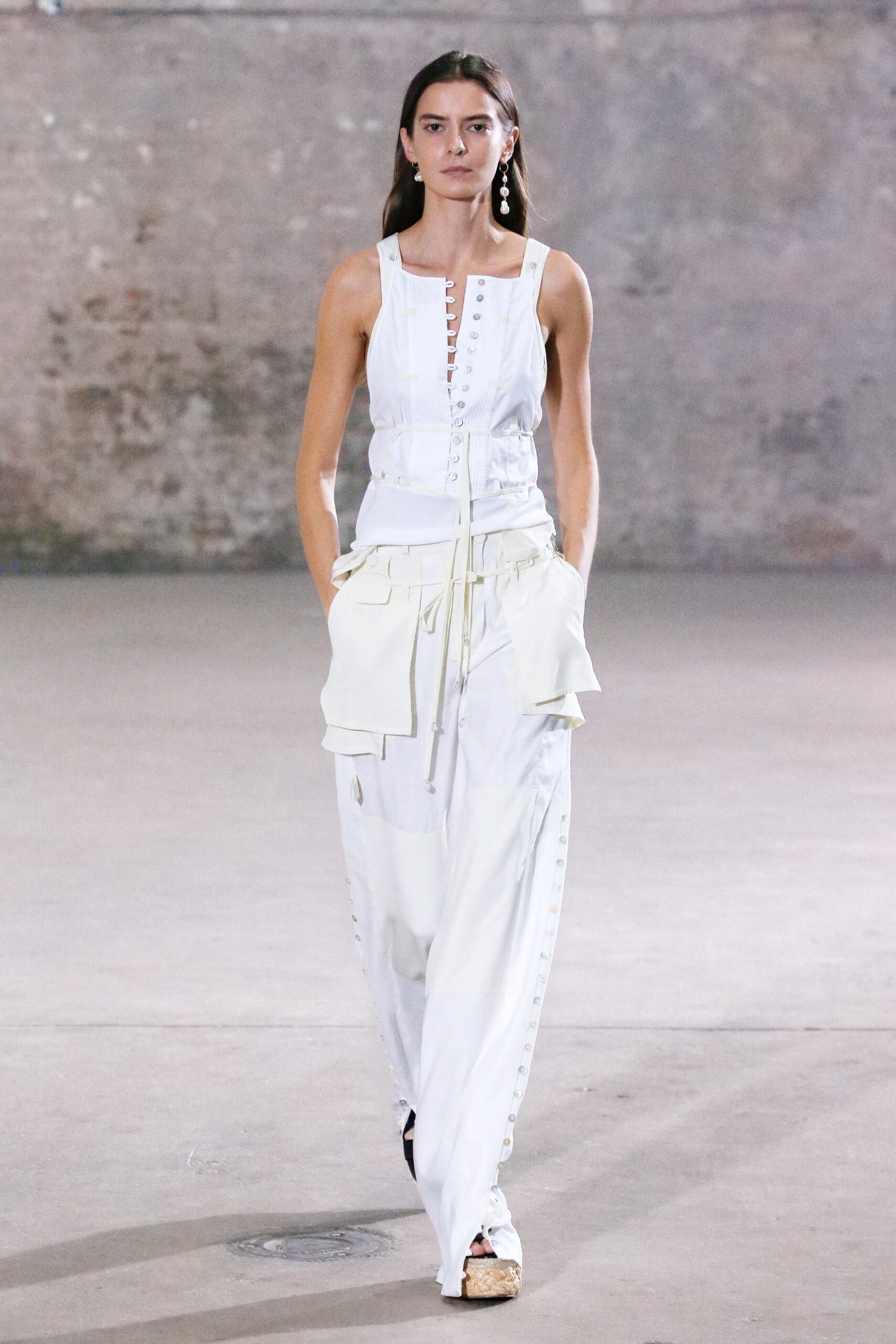 white fitted sleeveless jumpsuit