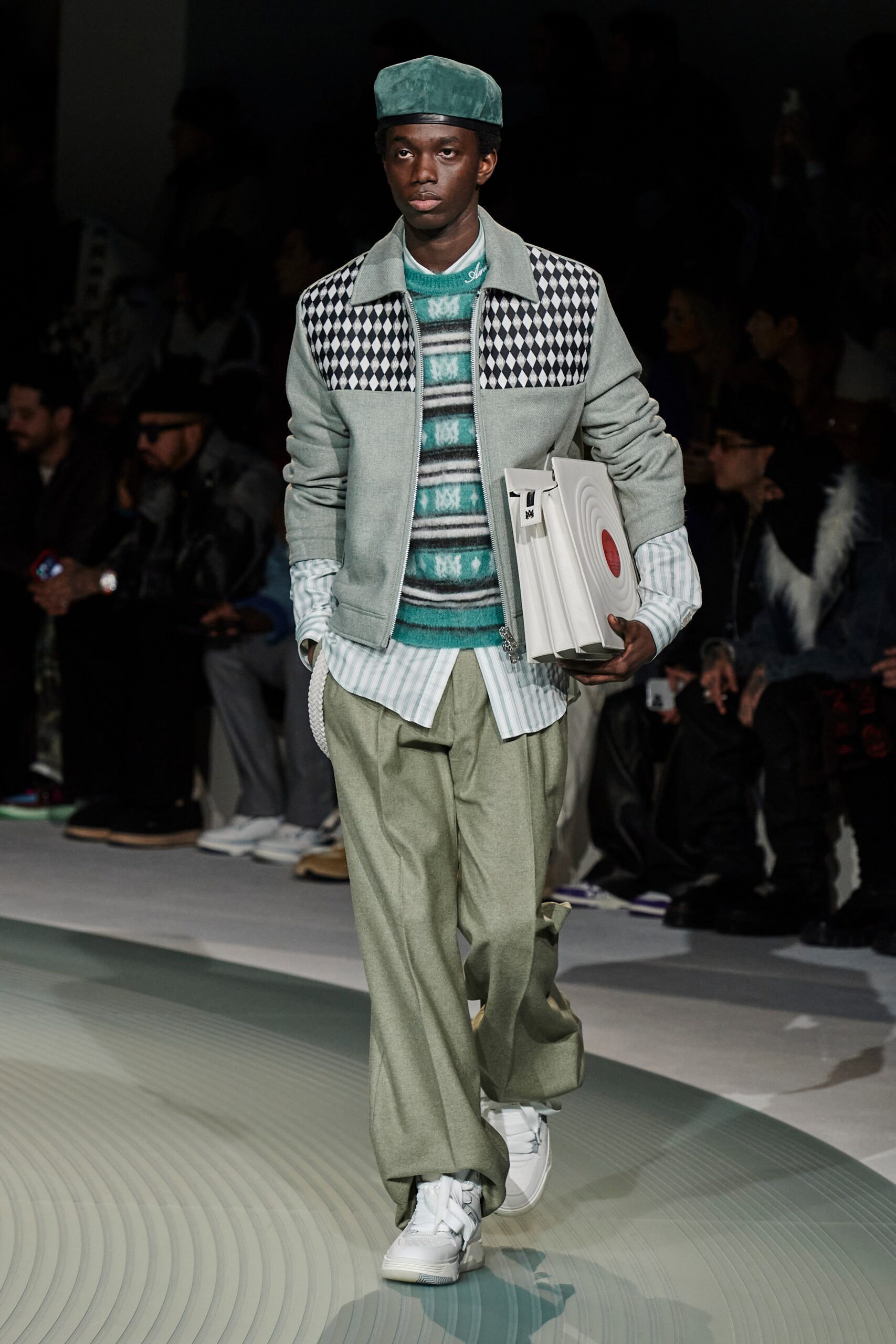 gray checked jacket with green sweater