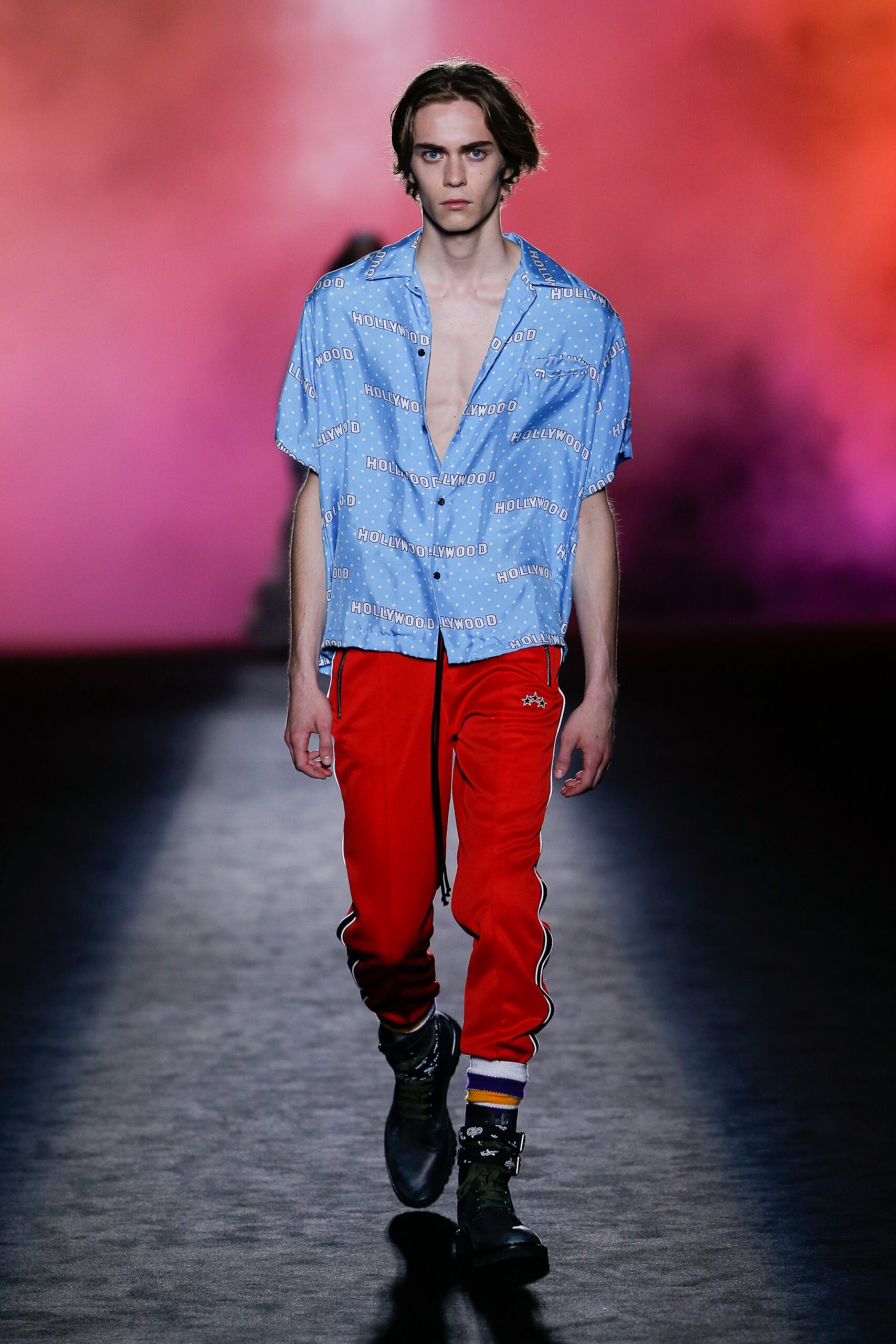 blue printed shirt and red pants