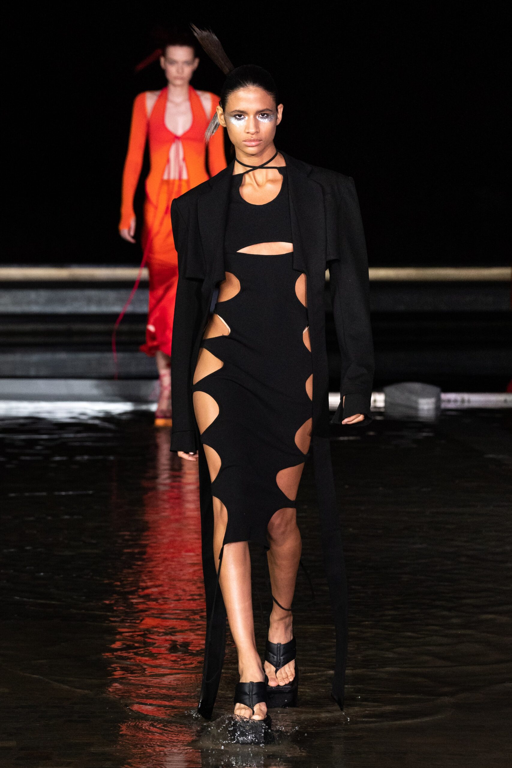 black cutout midi dress with oversized coat
