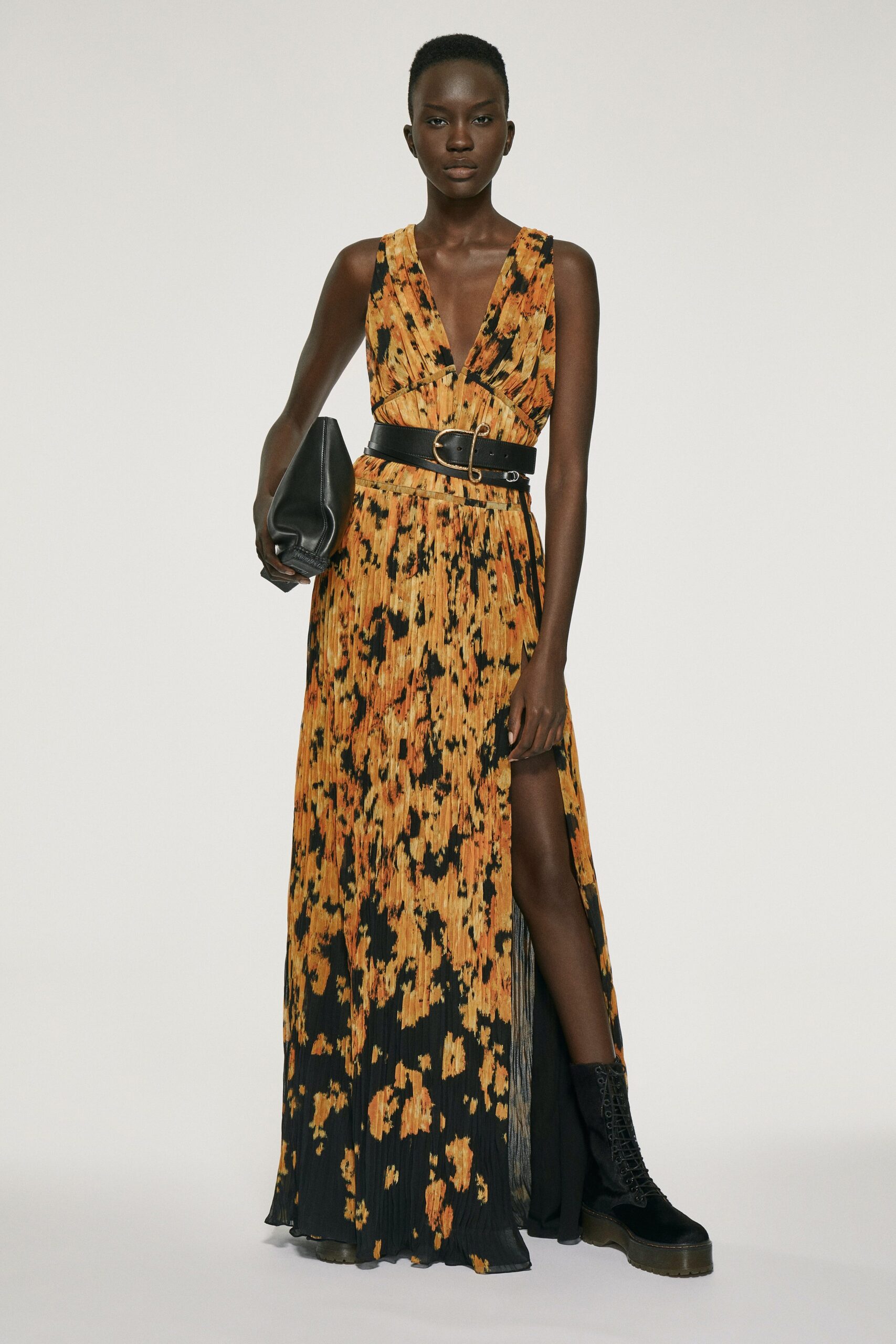 orange silk sleeveless v-neck fitted pleated flared dress