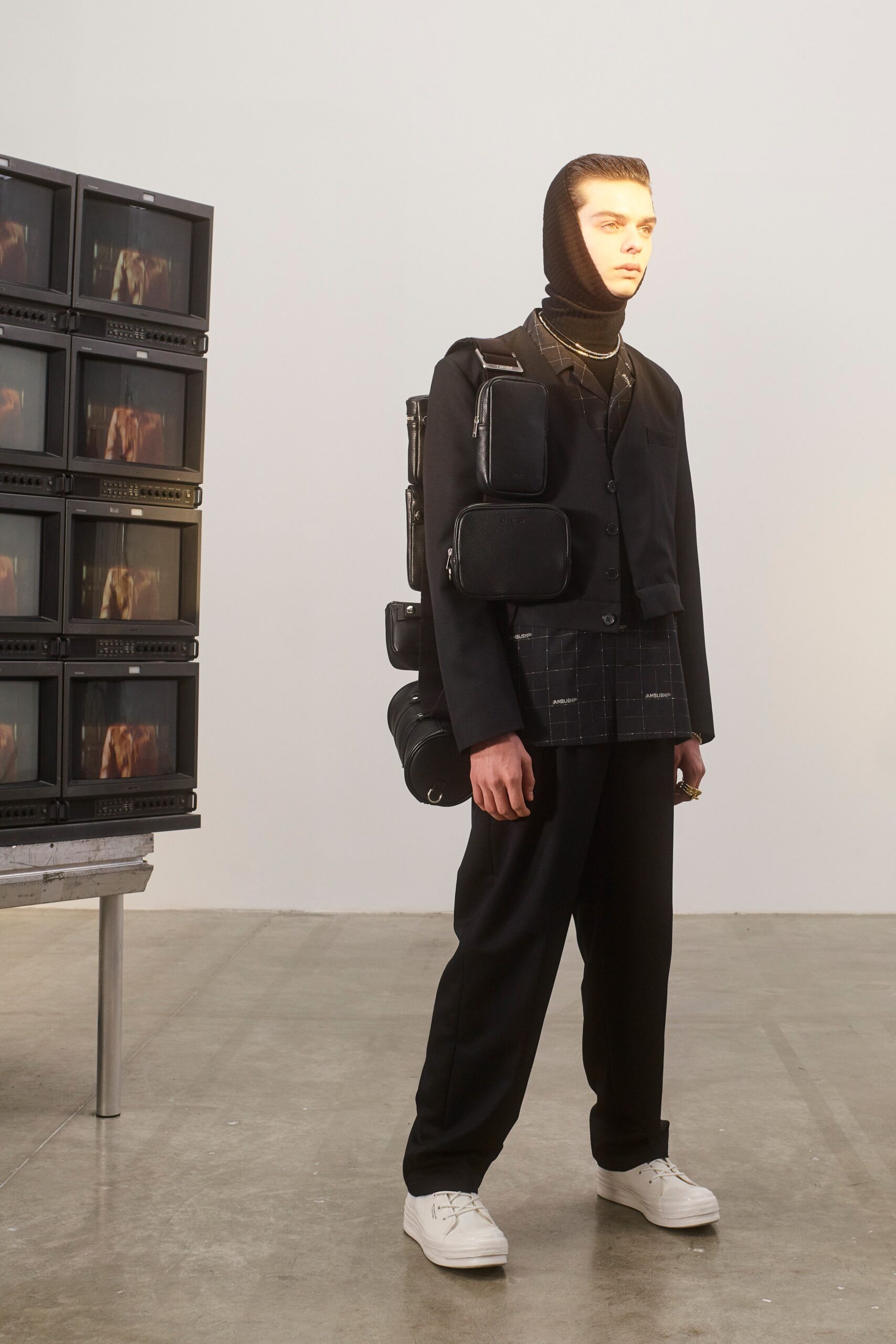 black tailored suit with hood