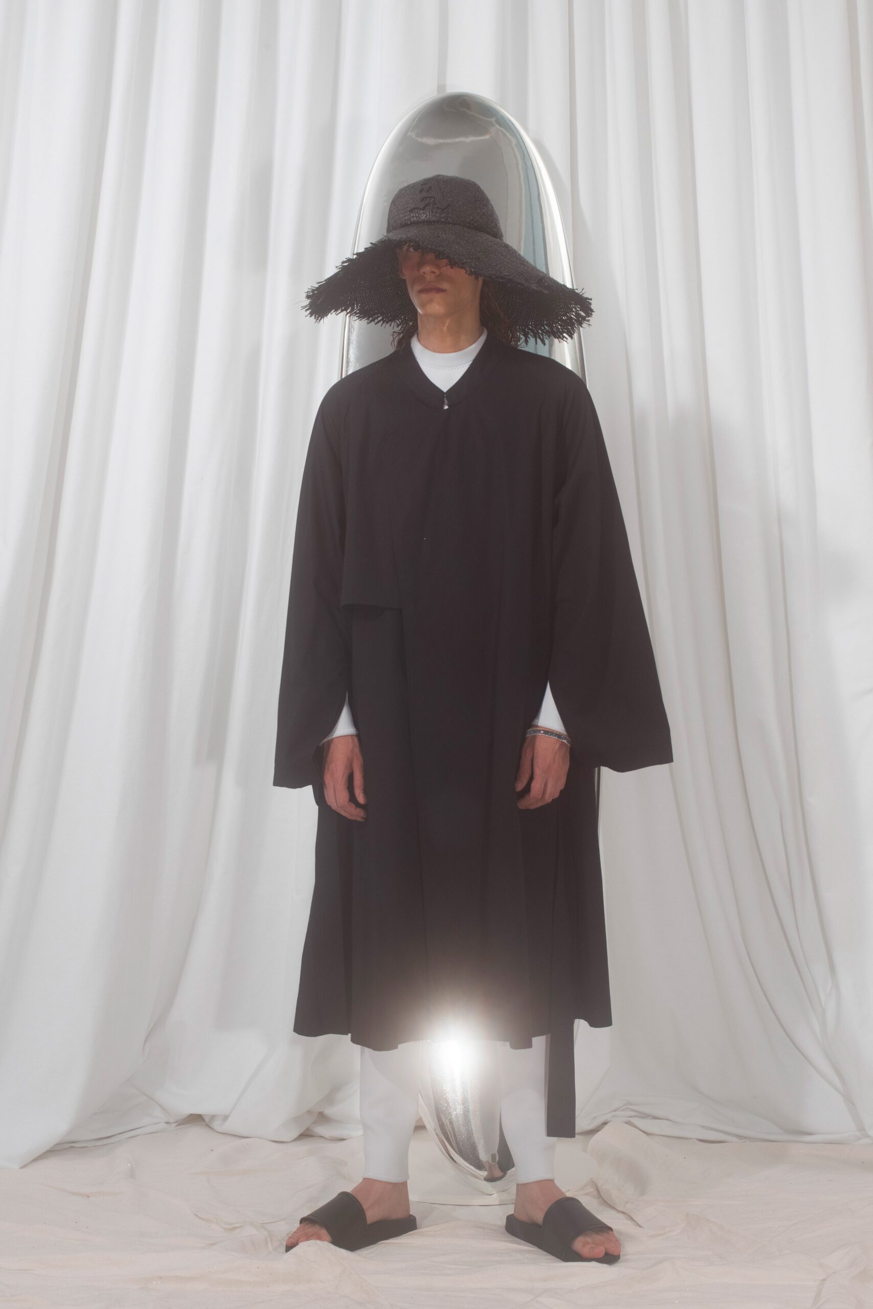 black cotton long-sleeve collared relaxed draped coat