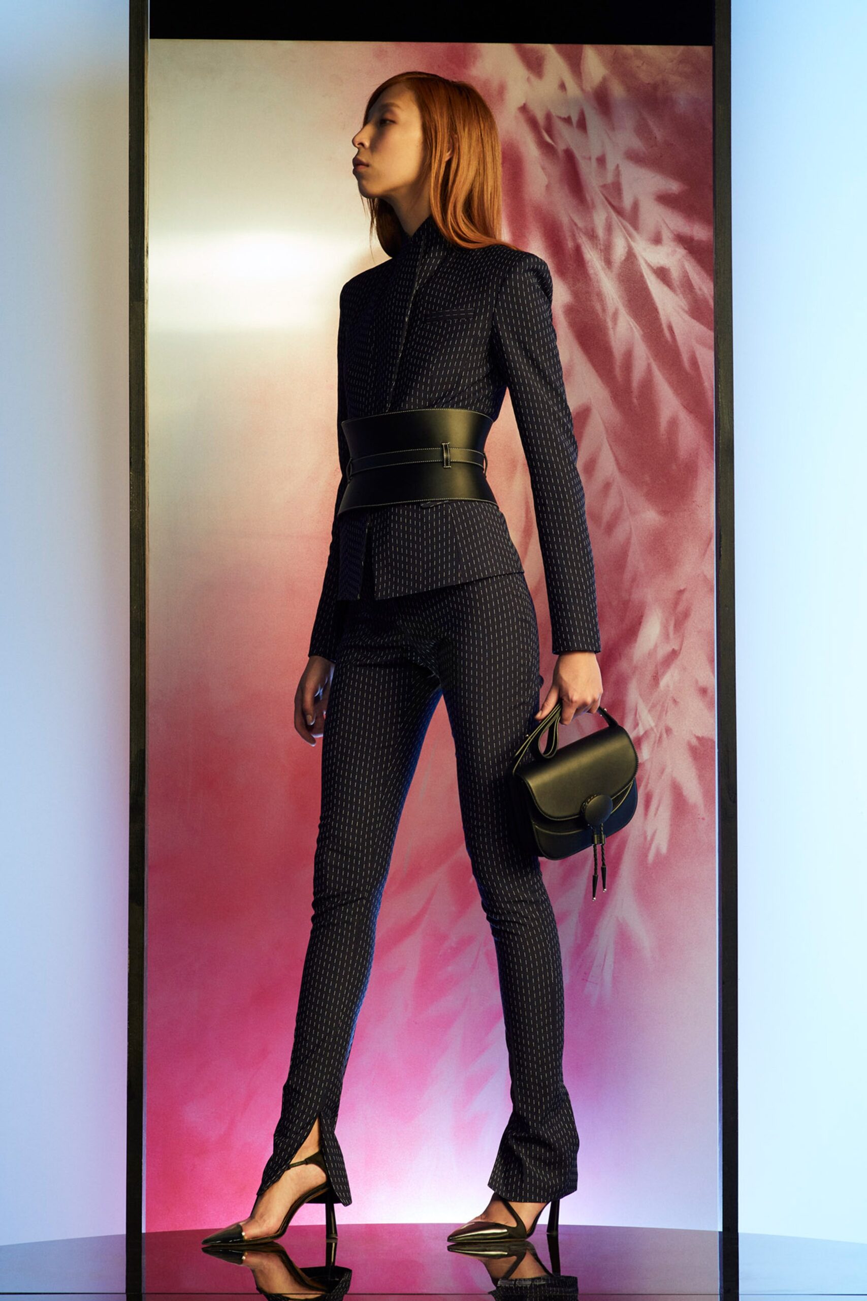 black tailored suit with slit pants