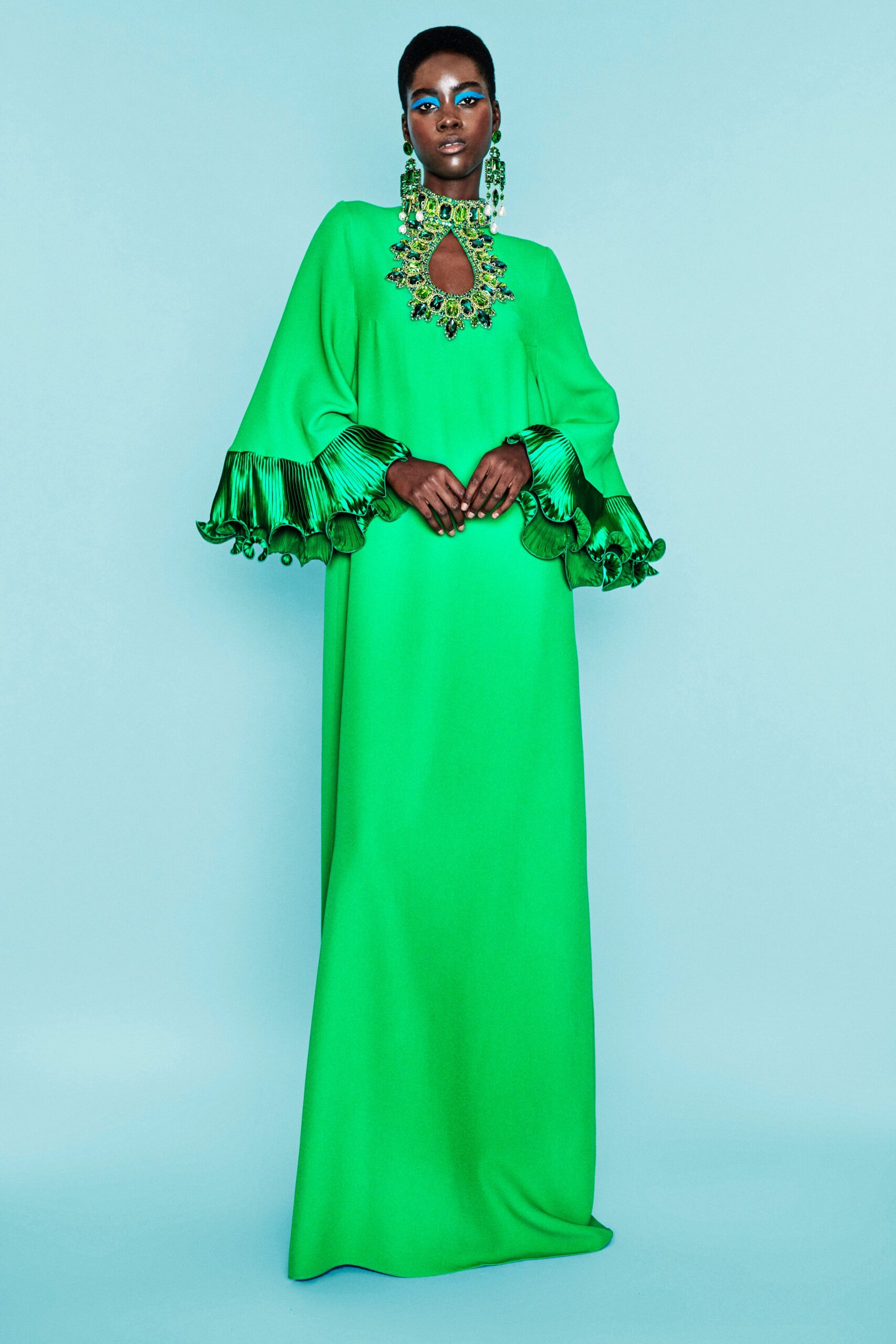 green silk pleated gown