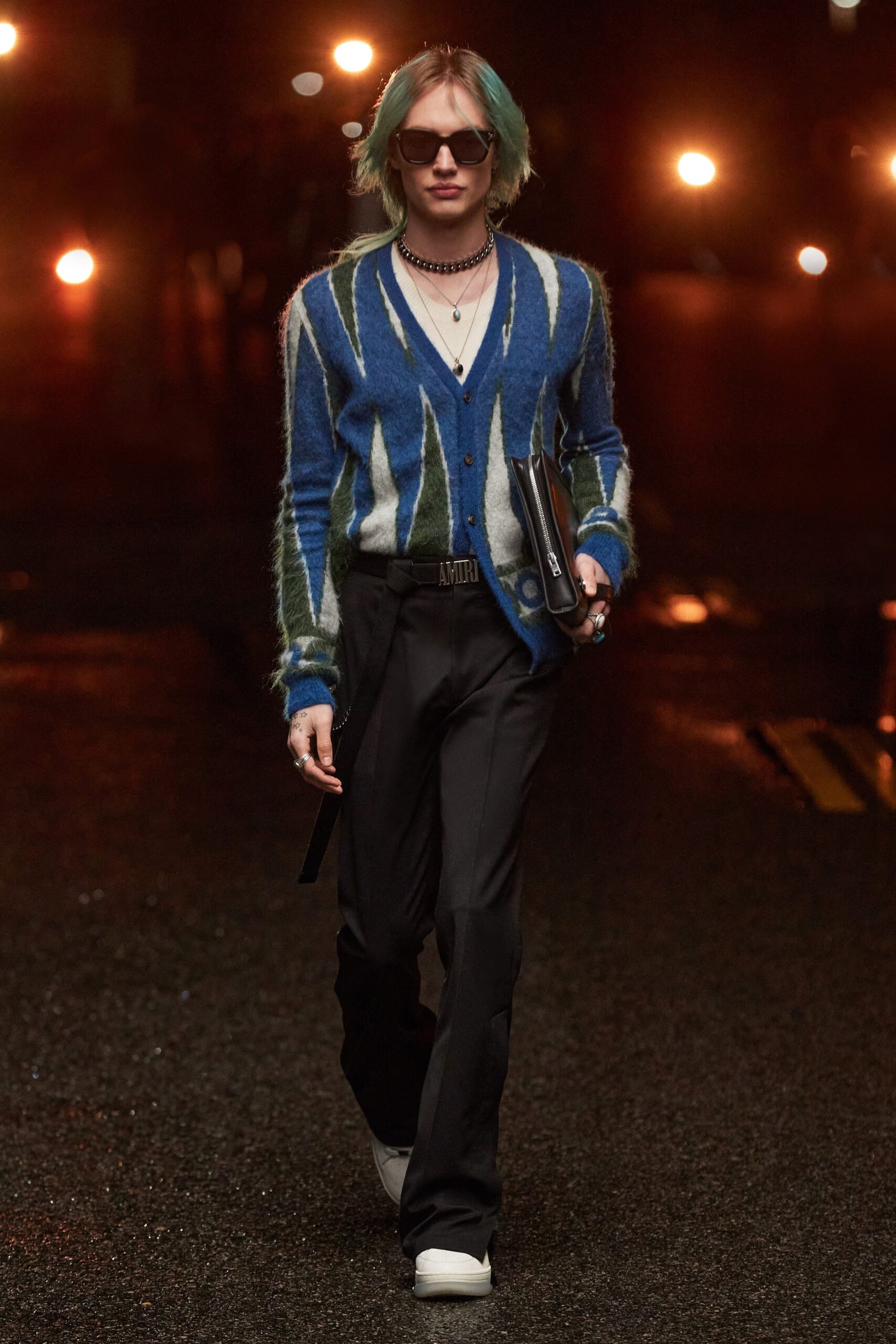 blue green fitted cardigan with black pants
