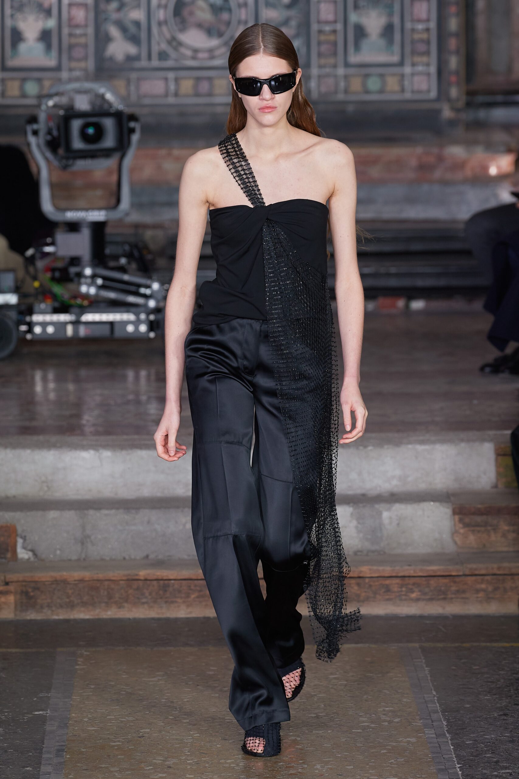 black asymmetric silk top and pants