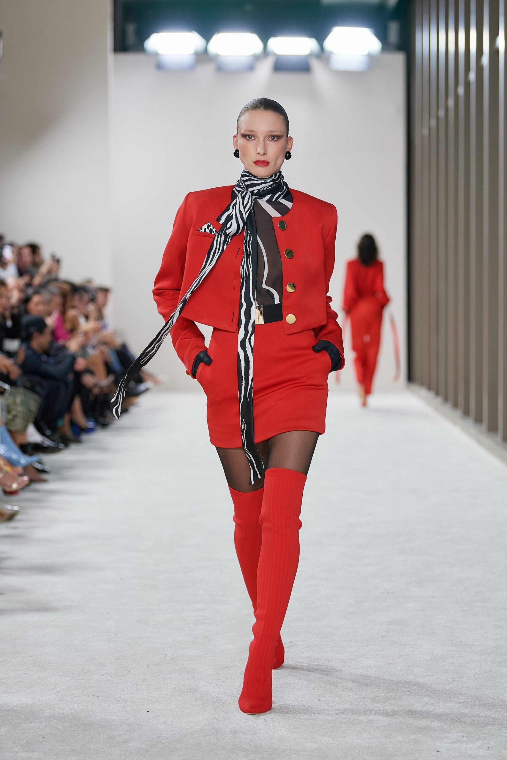 red fitted blazer and mini skirt