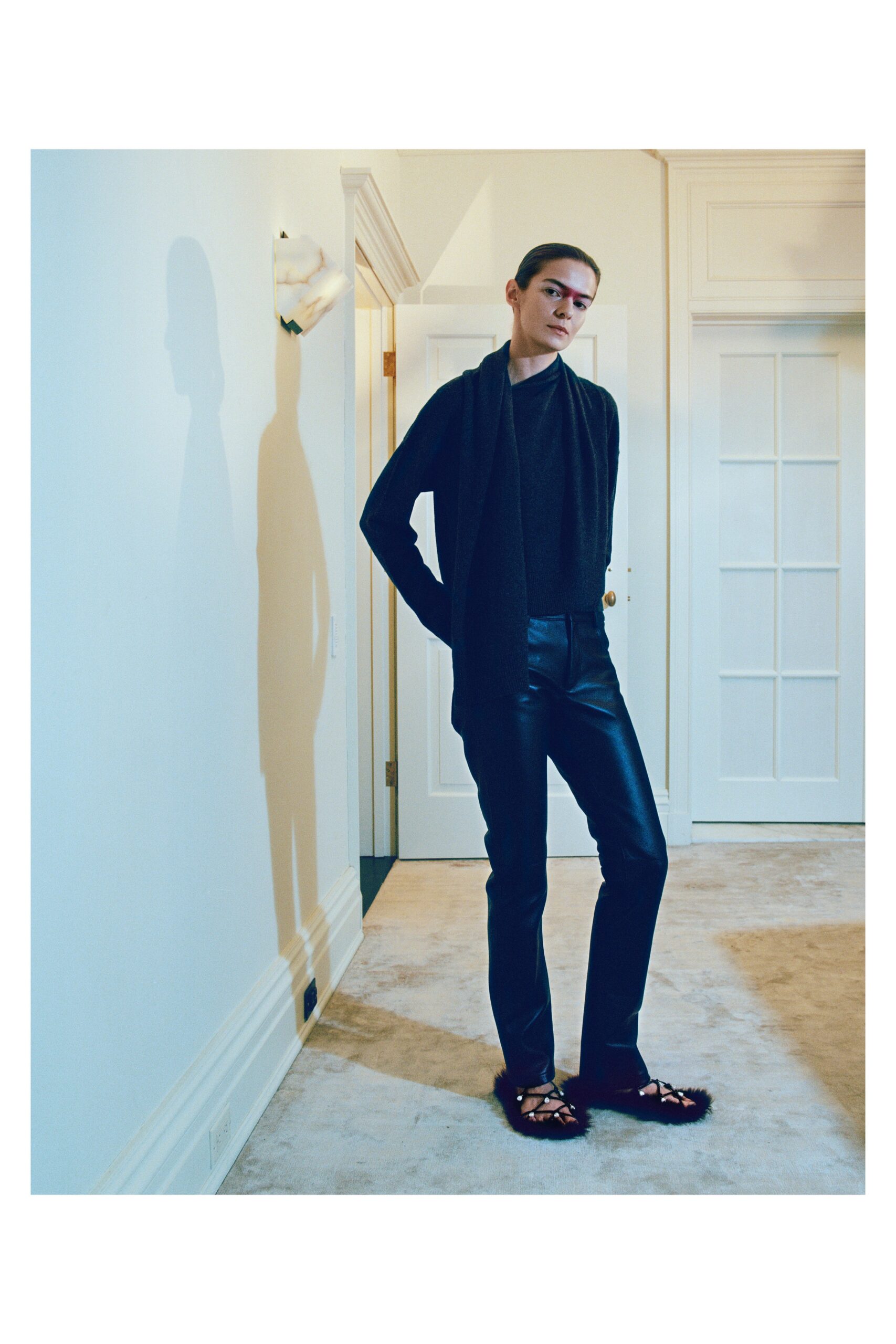 black wool cardigan and leather pants