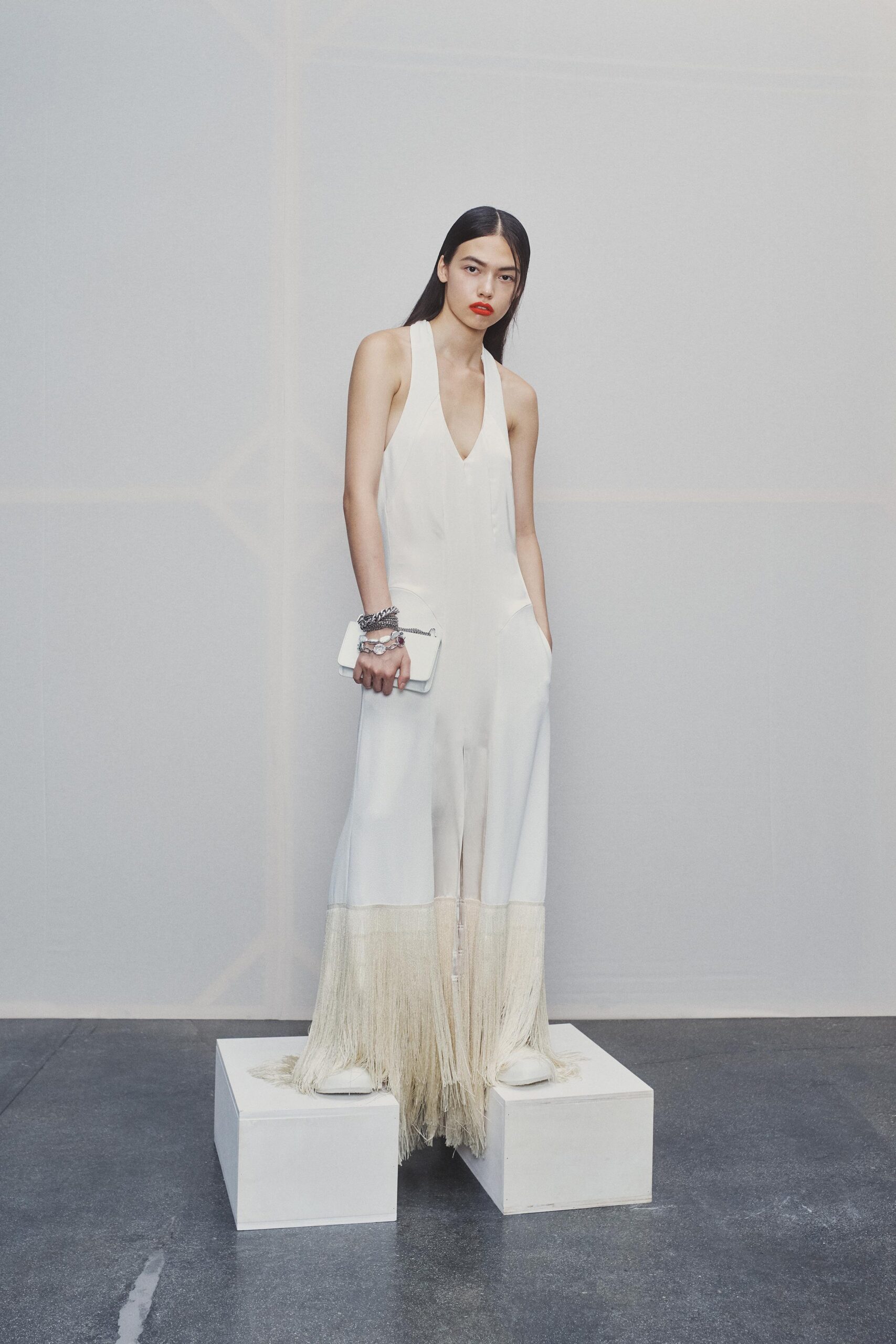 white silk sleeveless jumpsuit