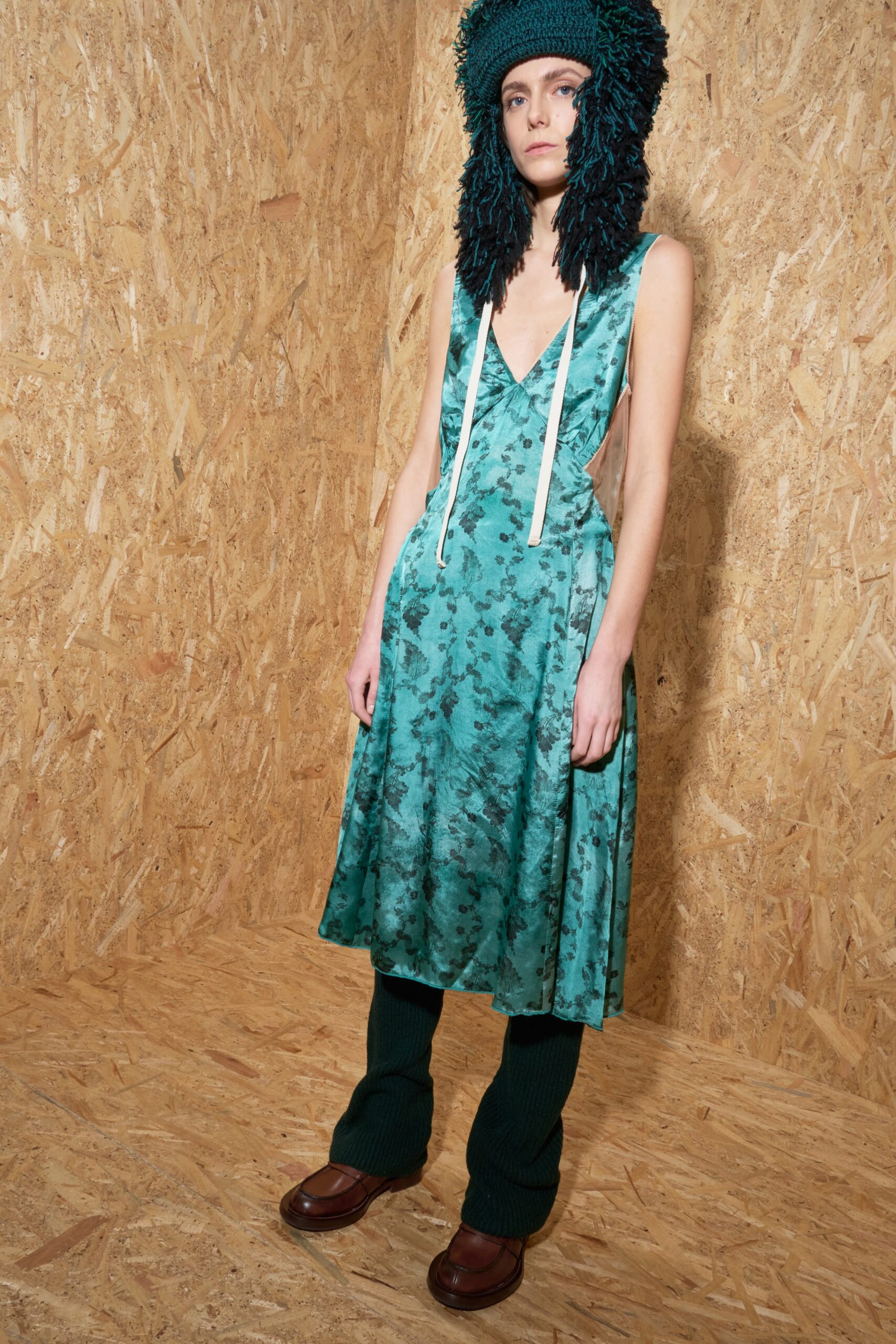 green silk midi dress with knit pants