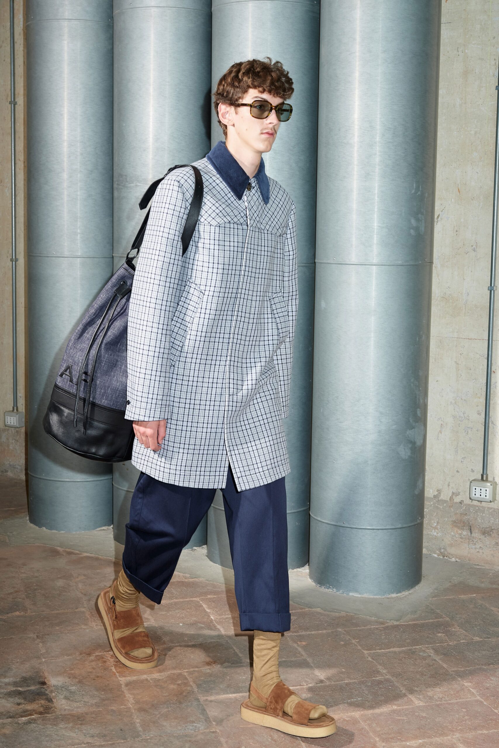 gray checked coat with relaxed pants
