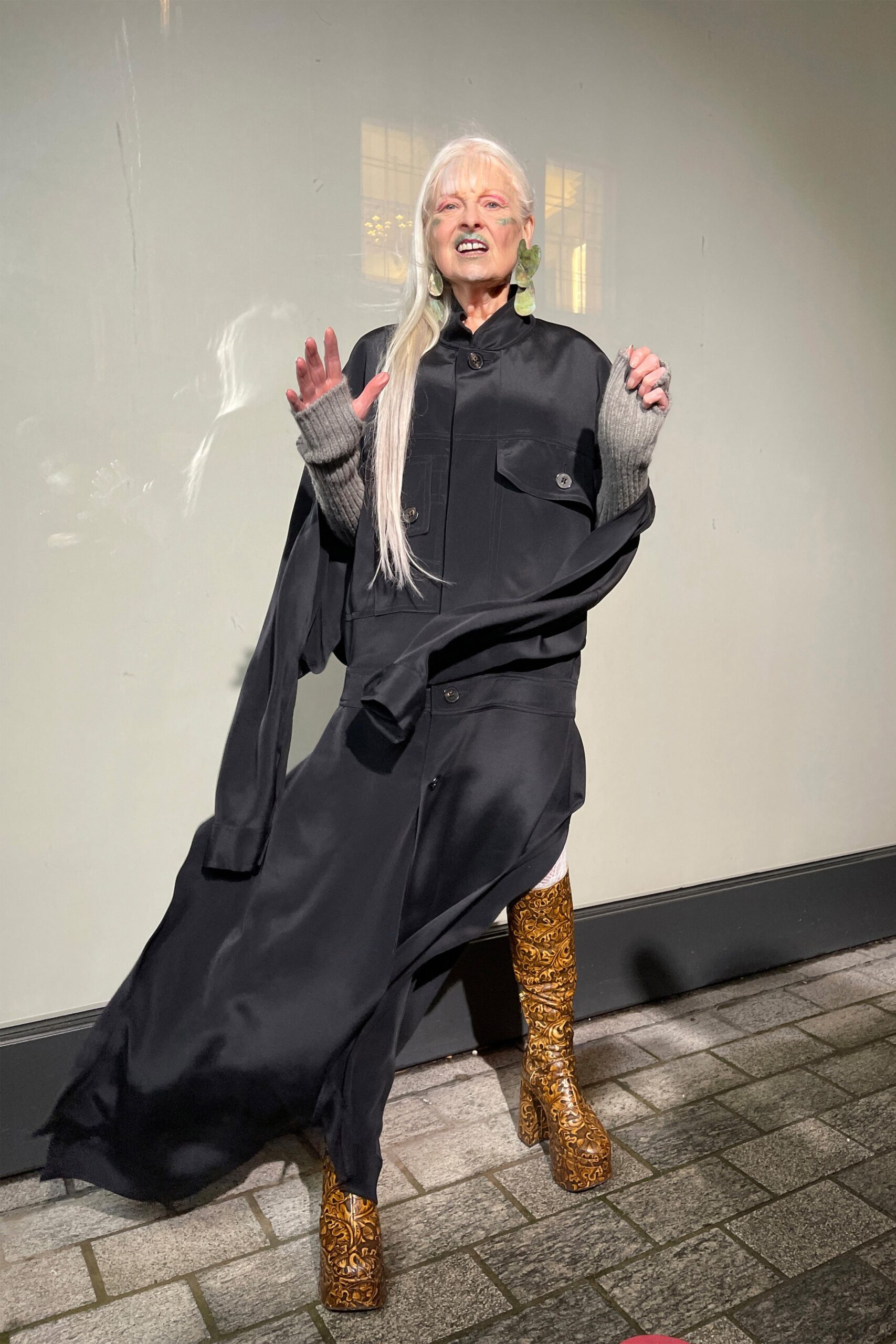 black silk coat with gray sweater
