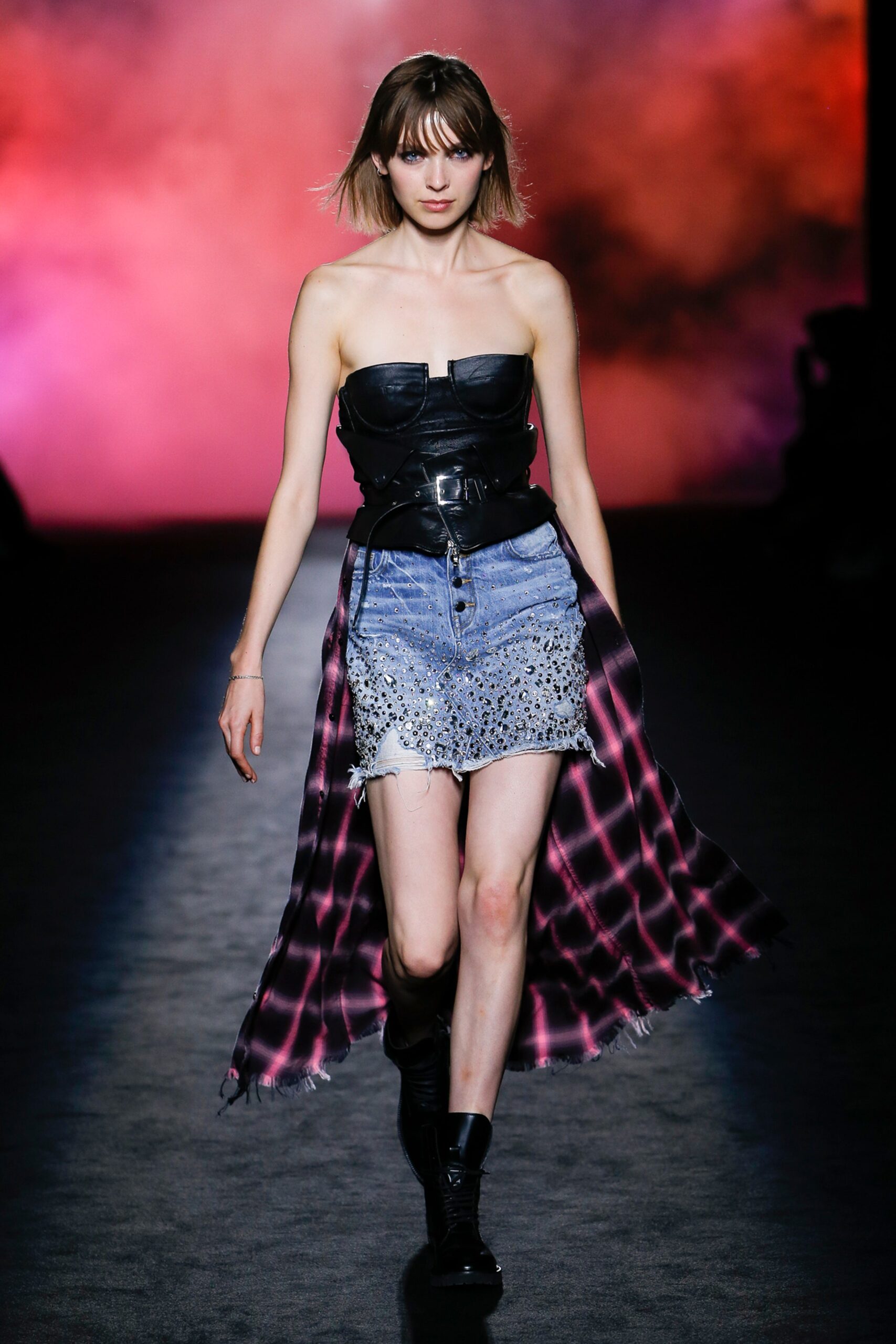 black leather strapless top with denim skirt