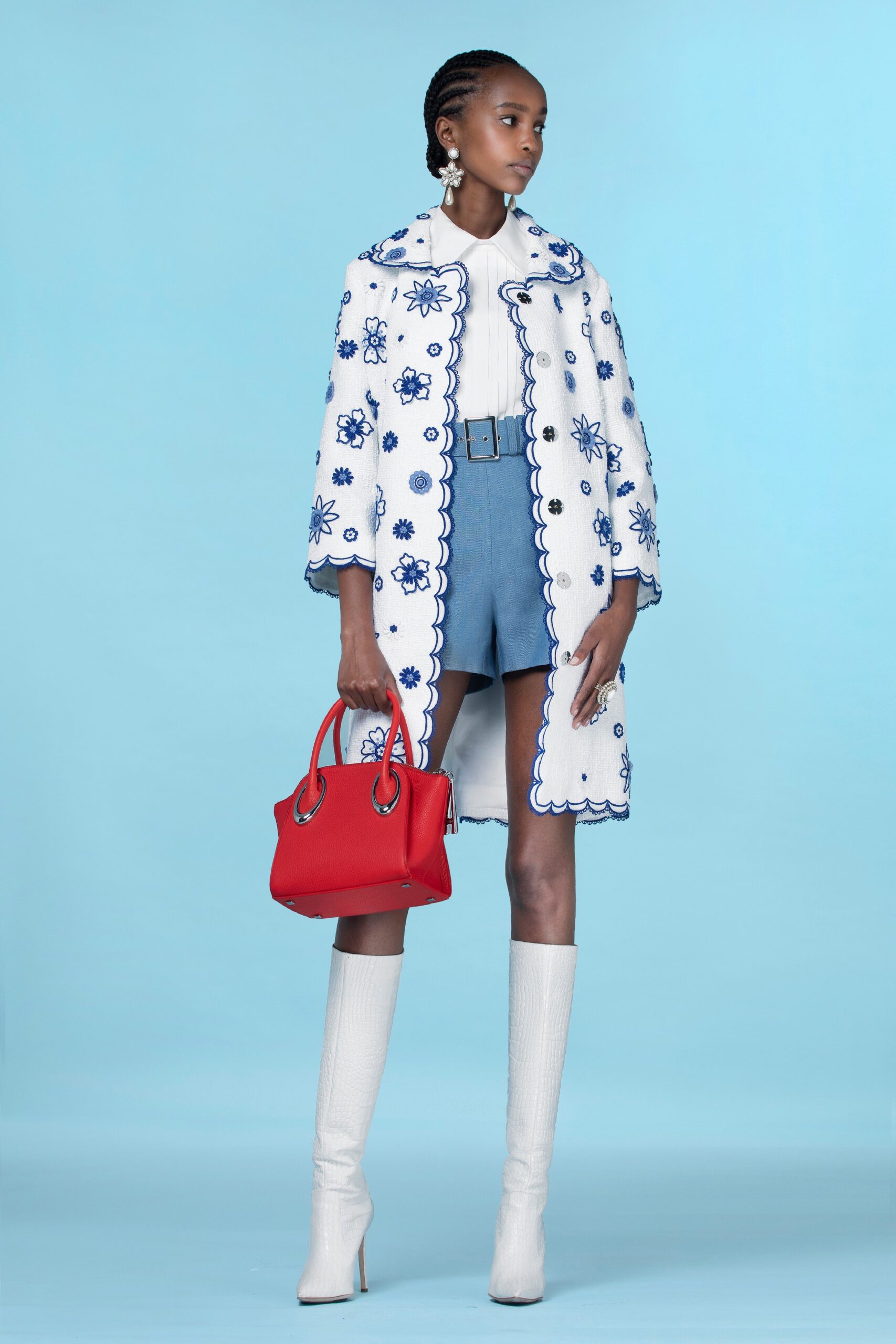 embroidered white coat with blue details