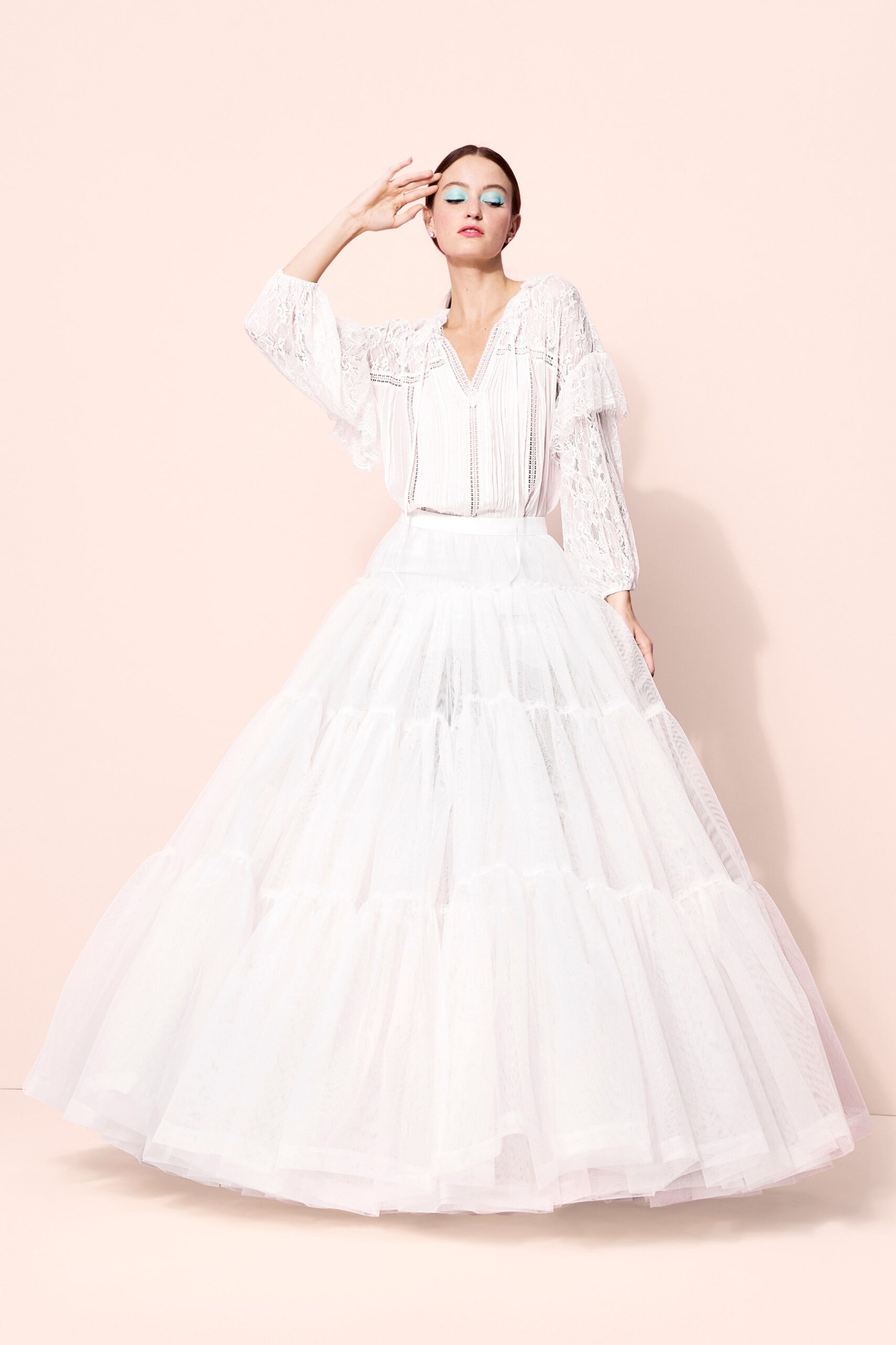 white lace blouse and tiered tulle skirt
