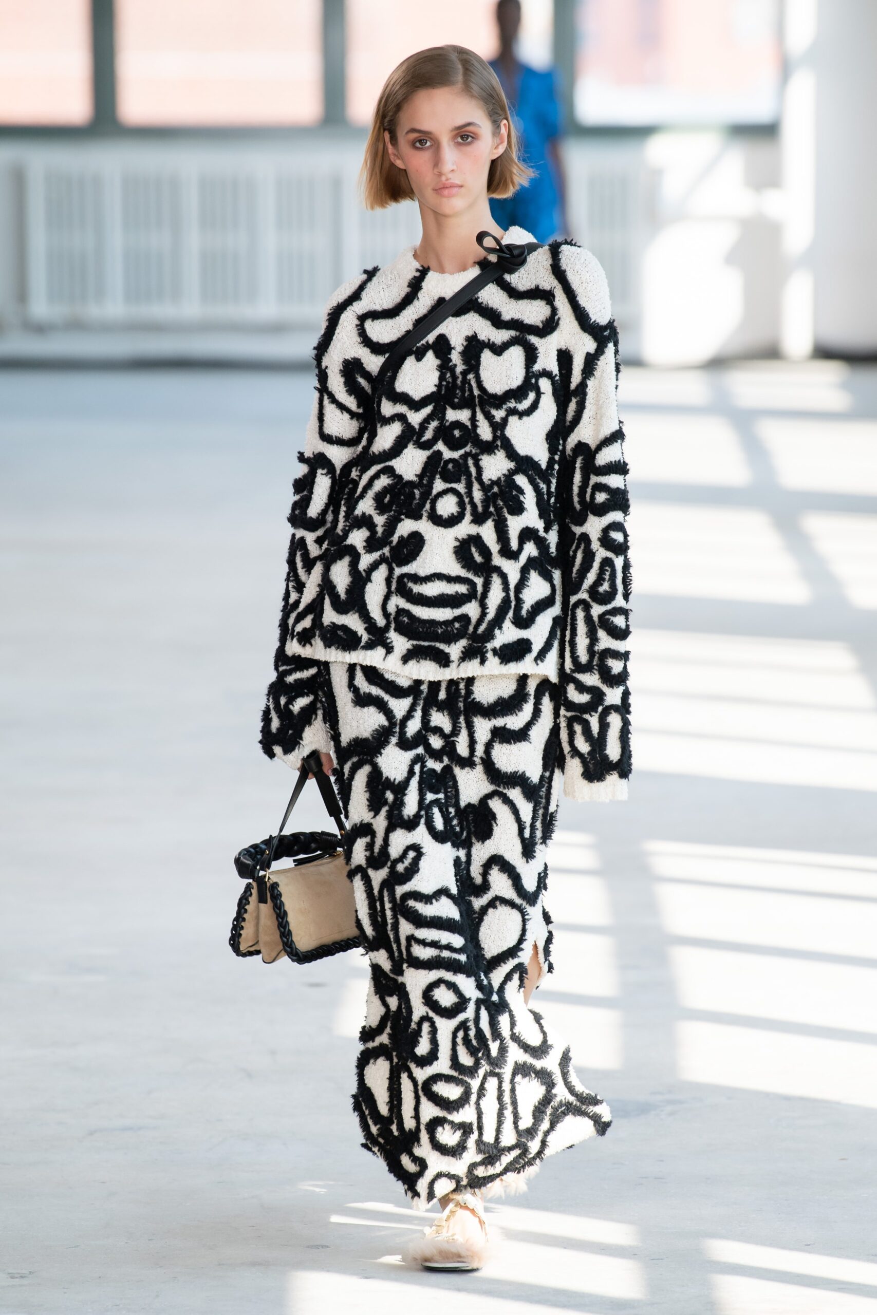 black and white layered sweater and skirt