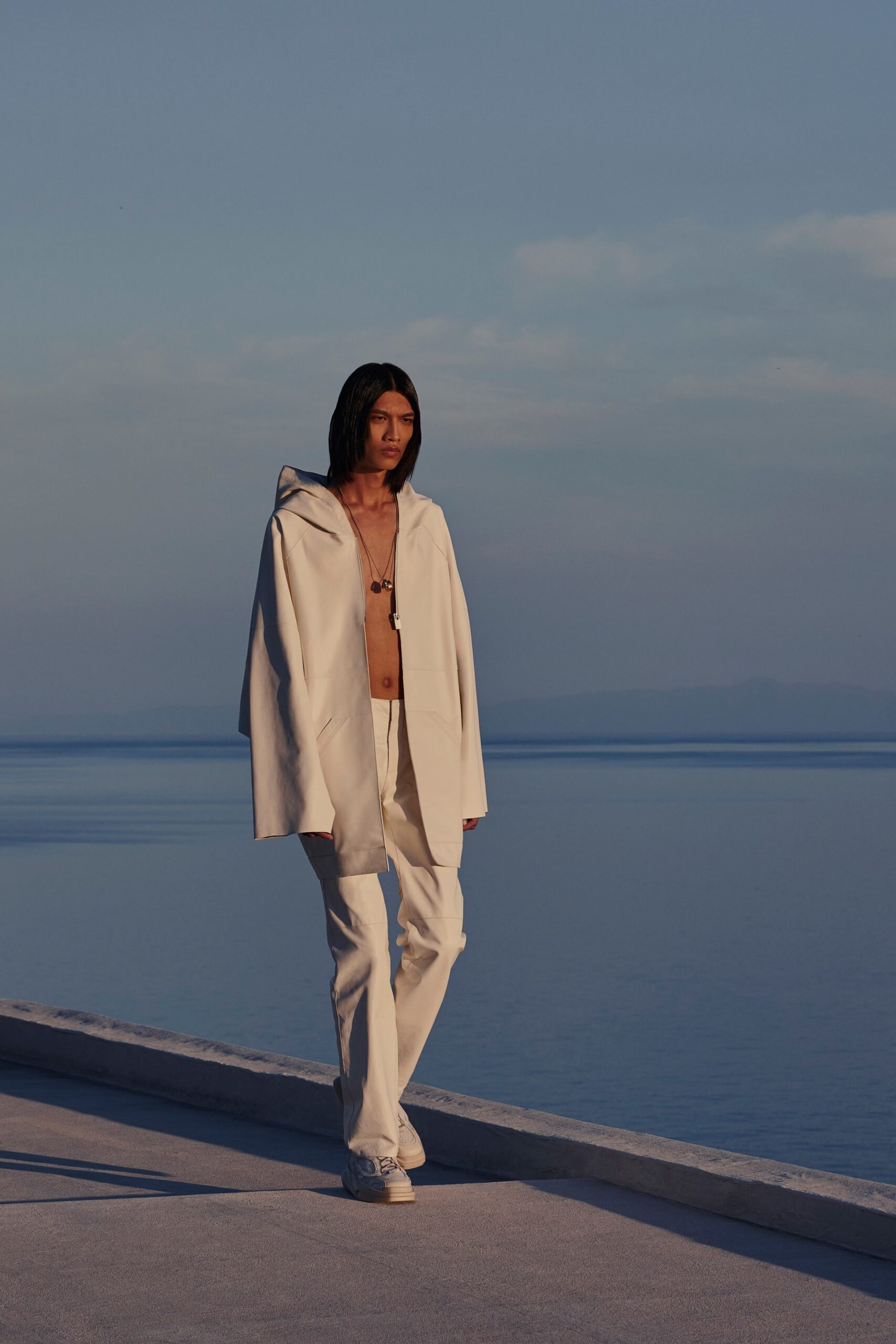 white relaxed jacket and fitted pants