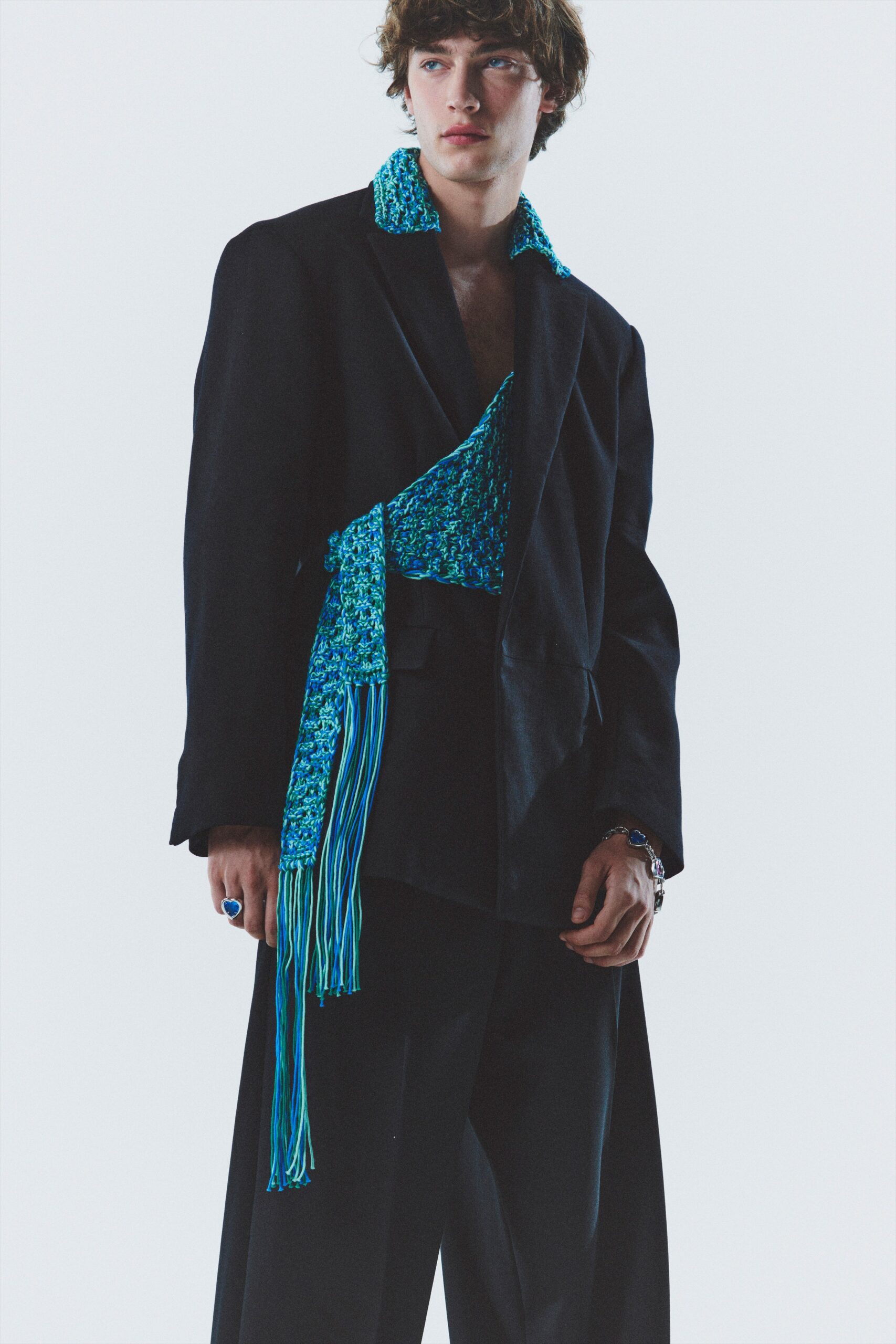 black jacket blue fringed top