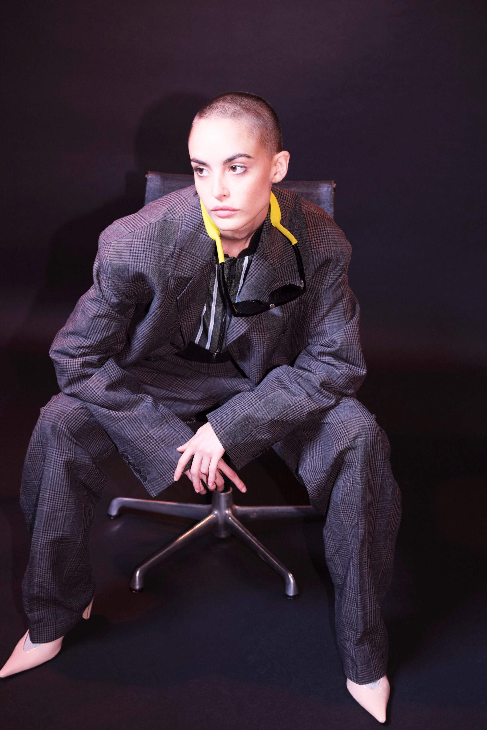 gray tailored suit with black top
