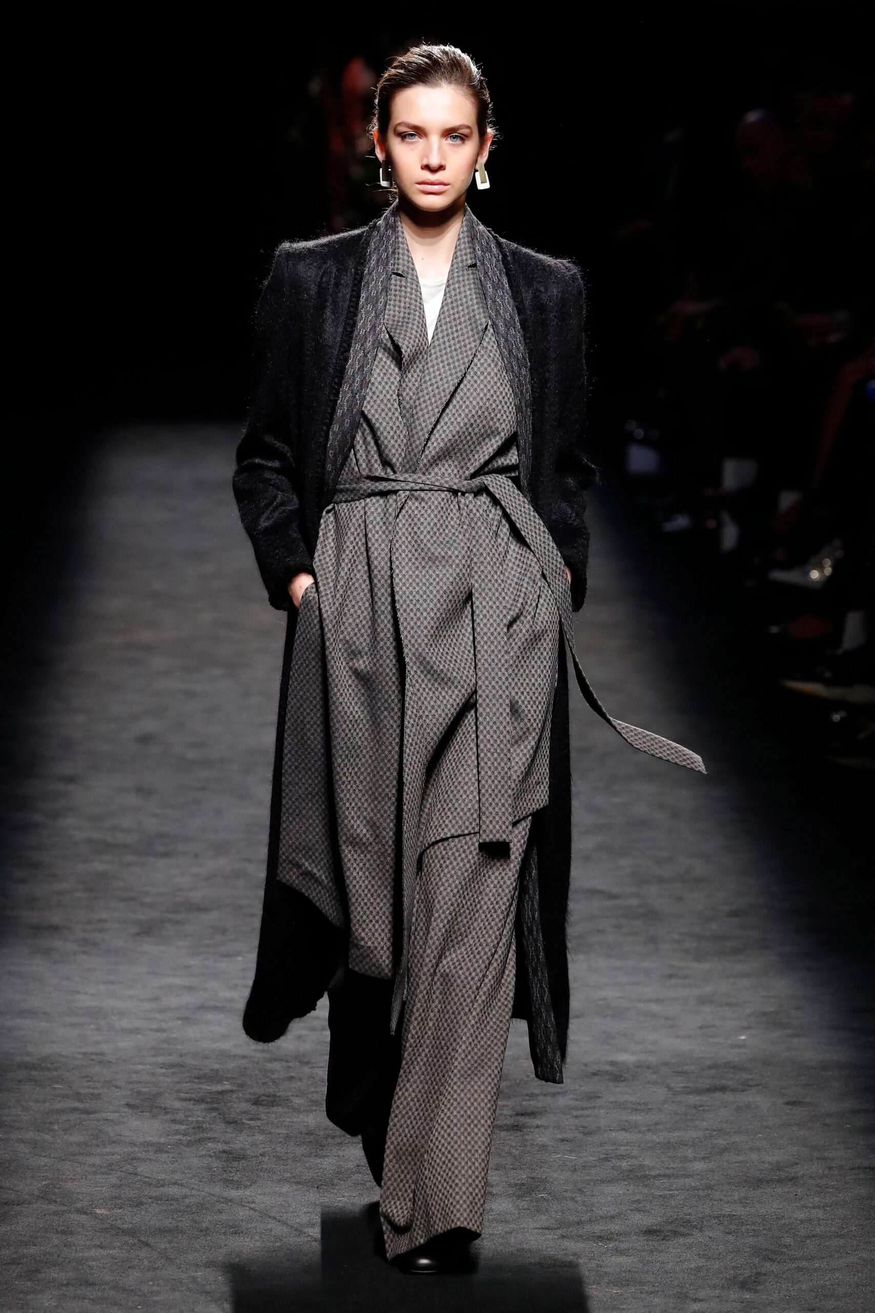 black wool coat with gray jumpsuit
