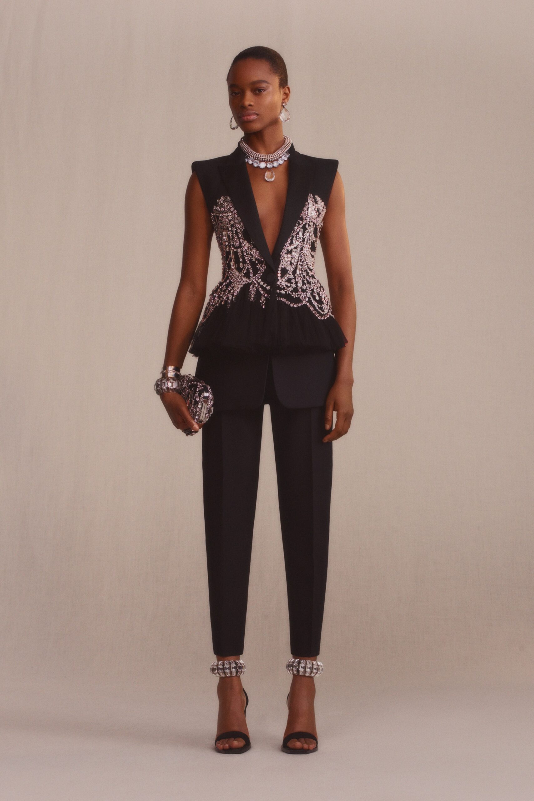 black beaded sleeveless blazer