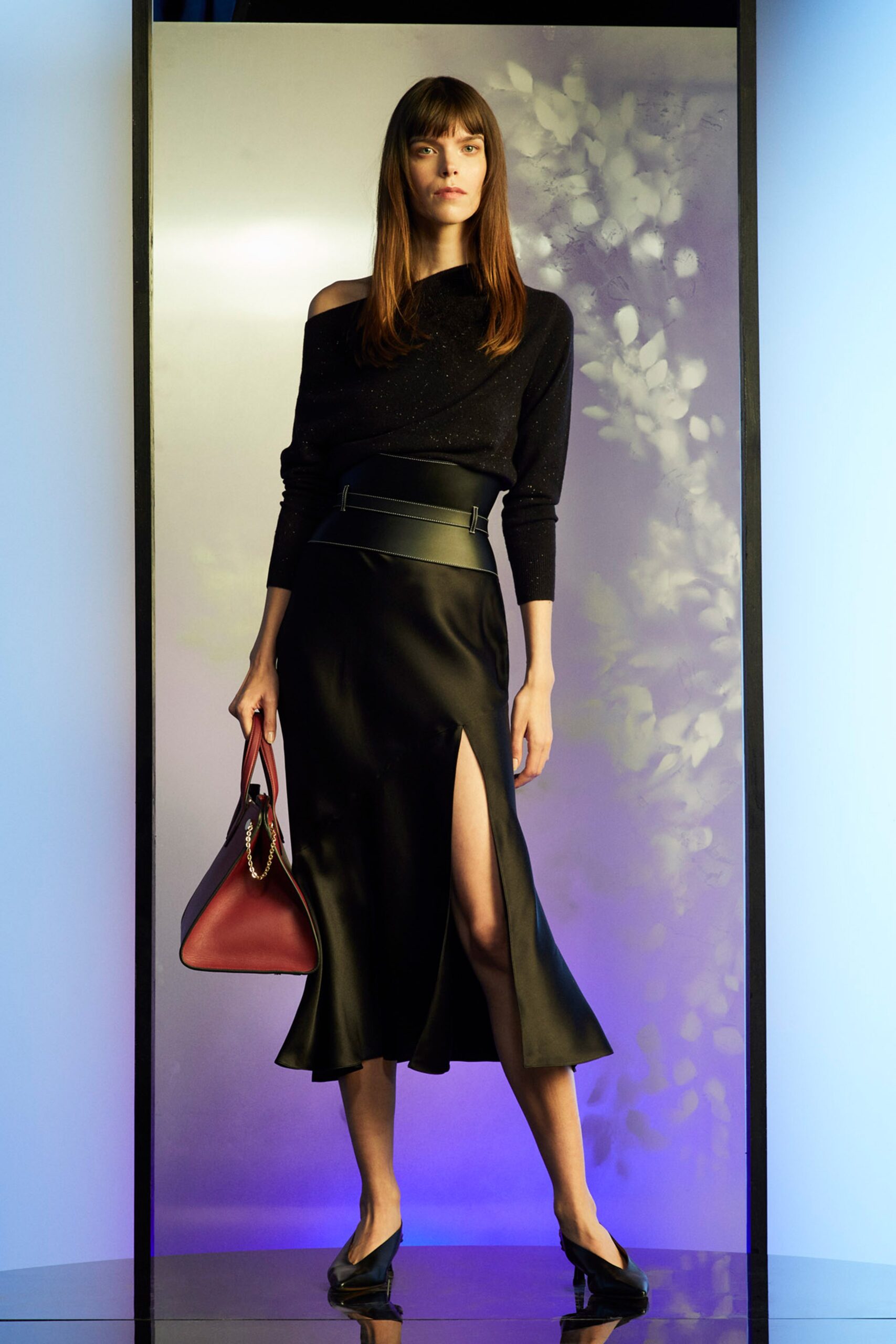 black silk off-shoulder top and skirt