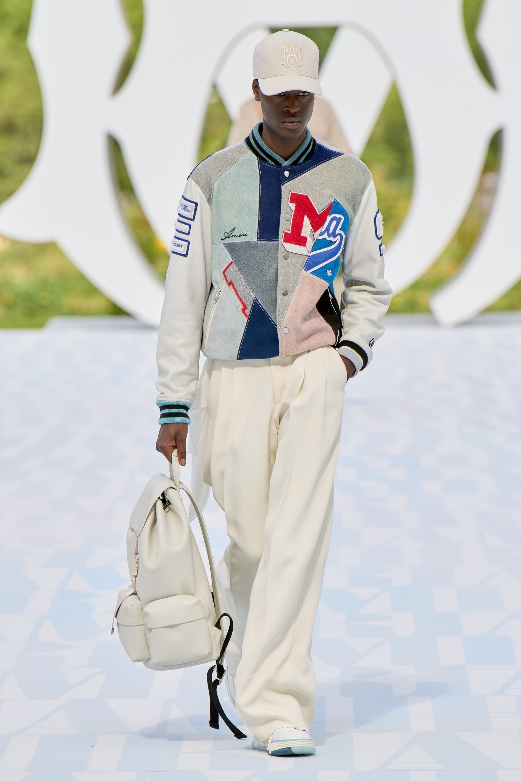 gray color-blocked jacket with white pants