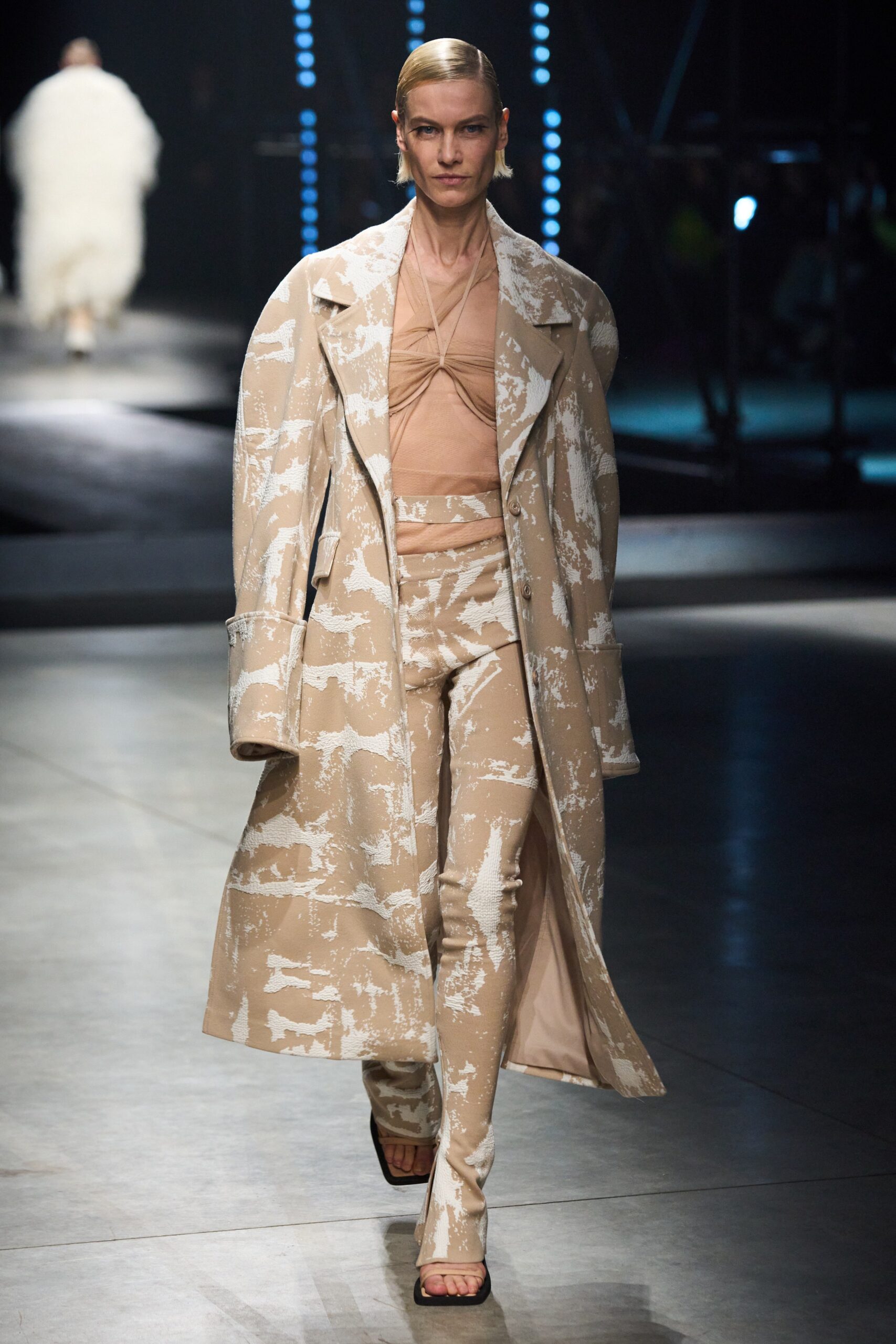 beige cotton long-sleeve collared relaxed printed coat