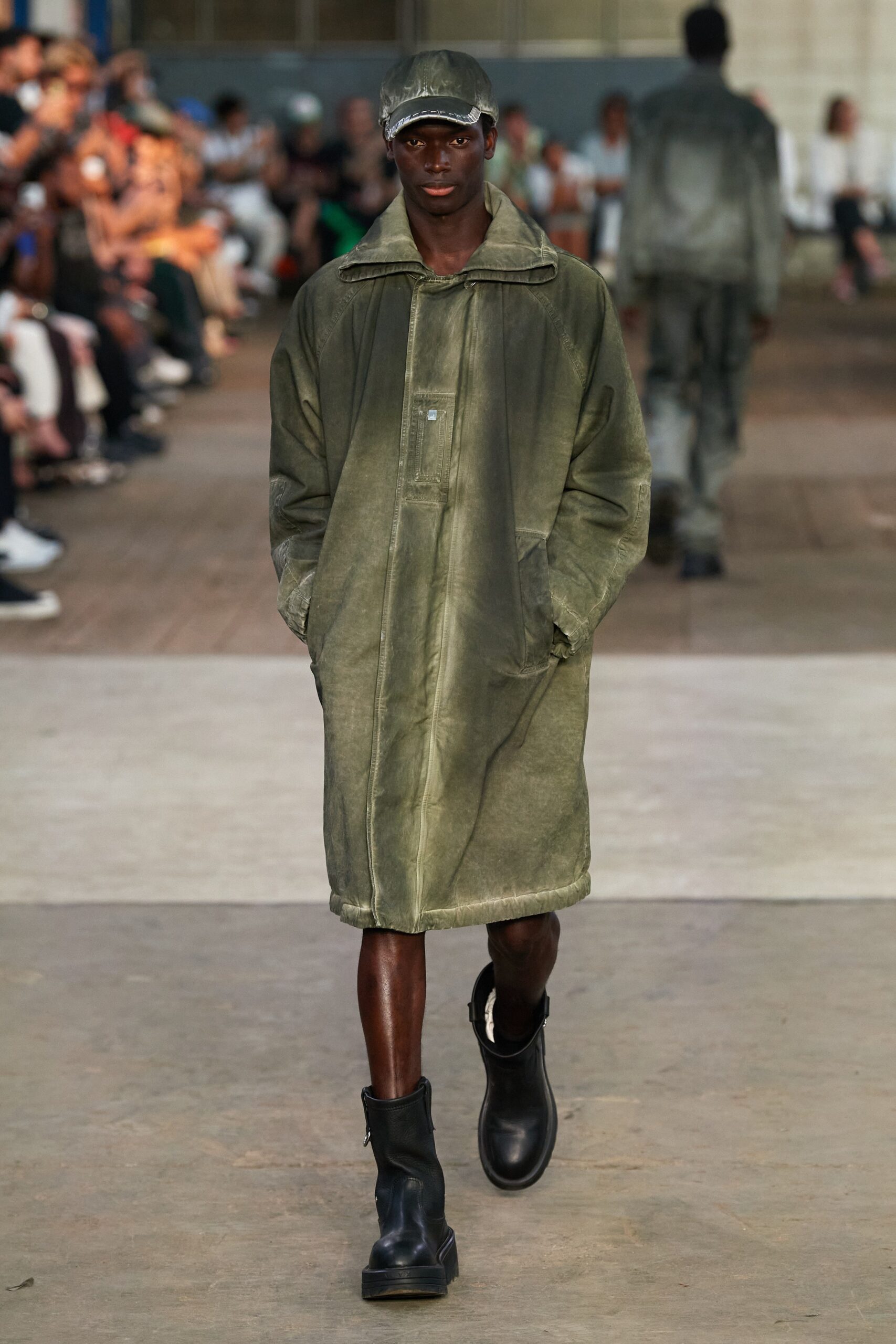 green denim coat with black boots