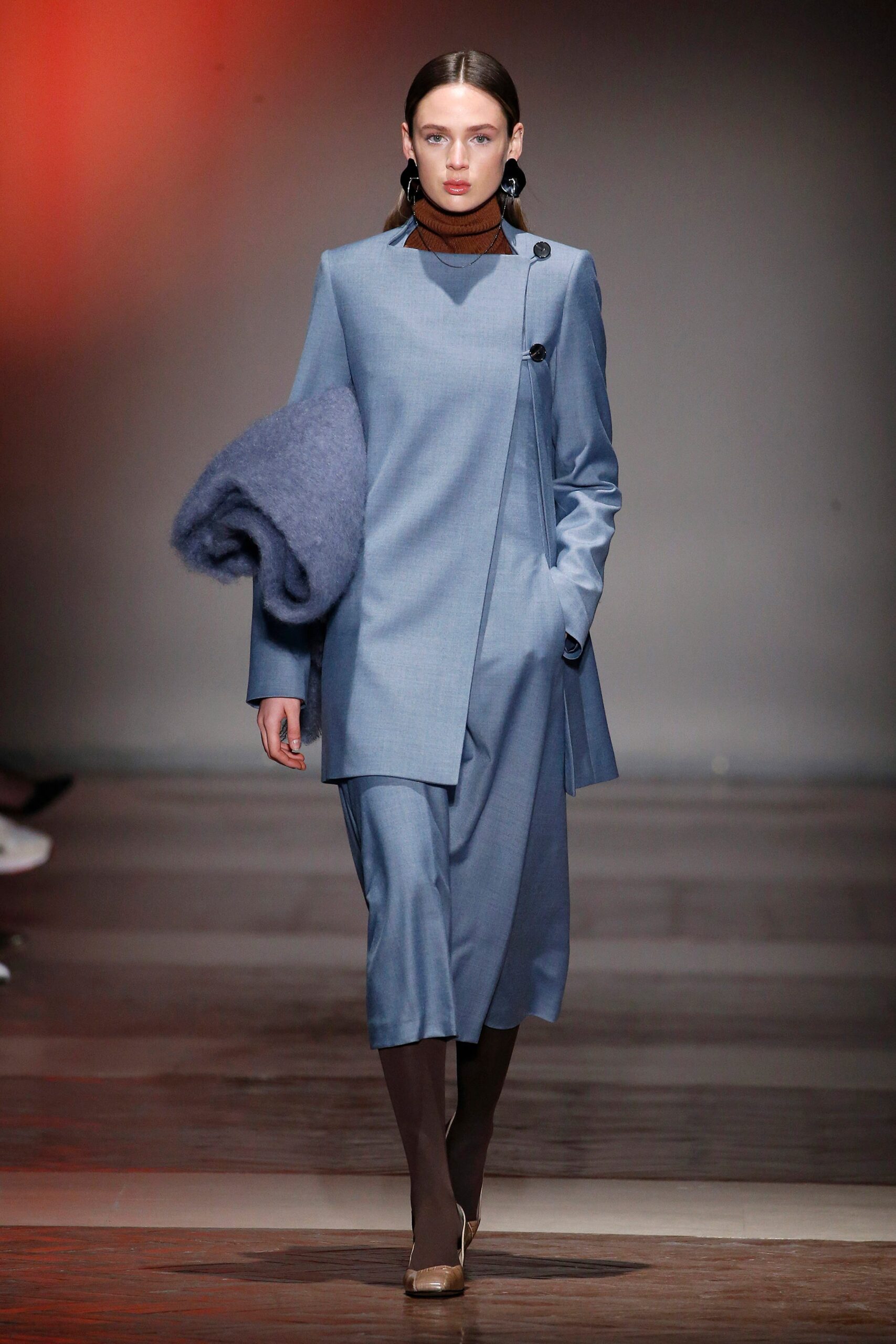 blue tailored suit with turtleneck