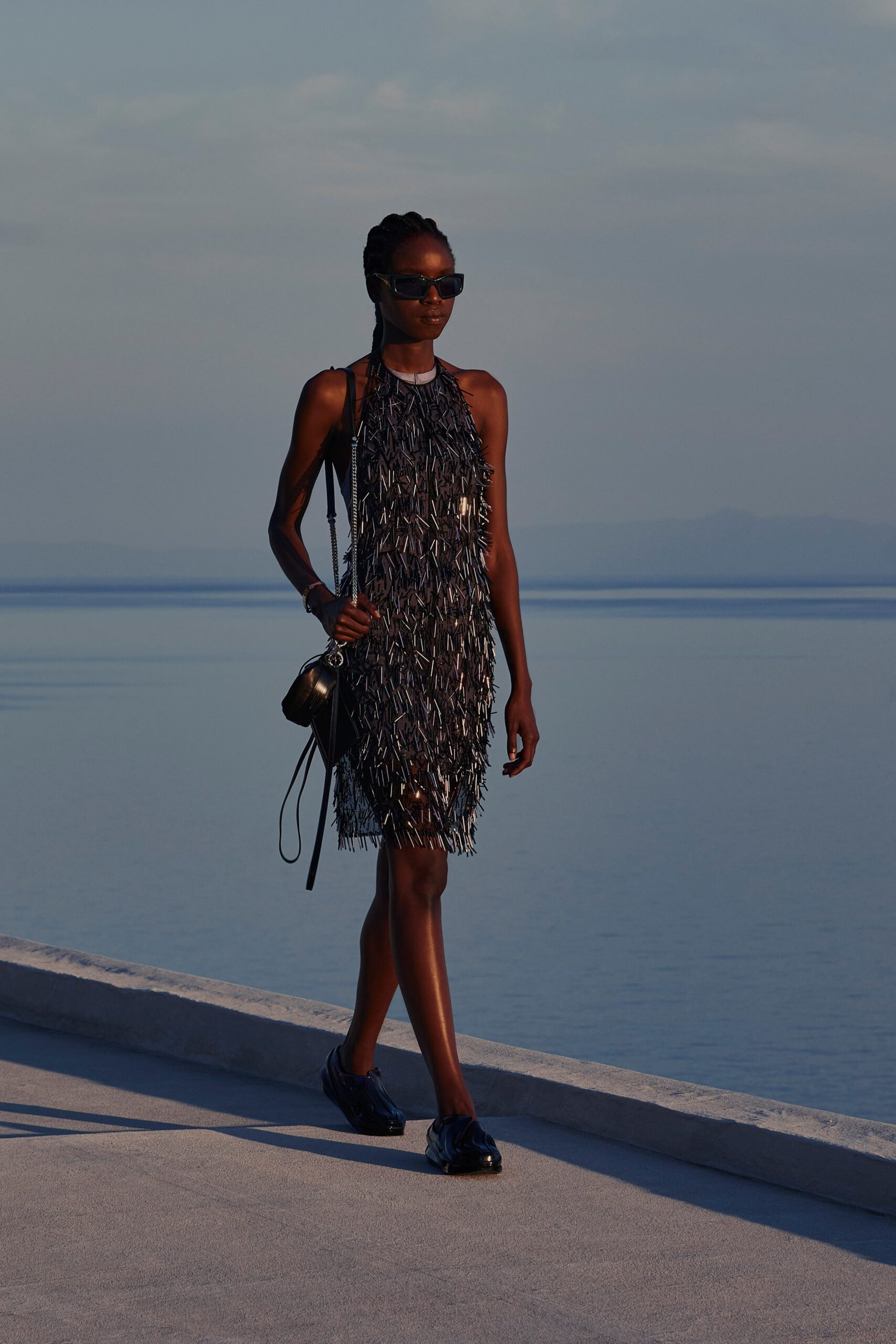 black fringed sleeveless dress