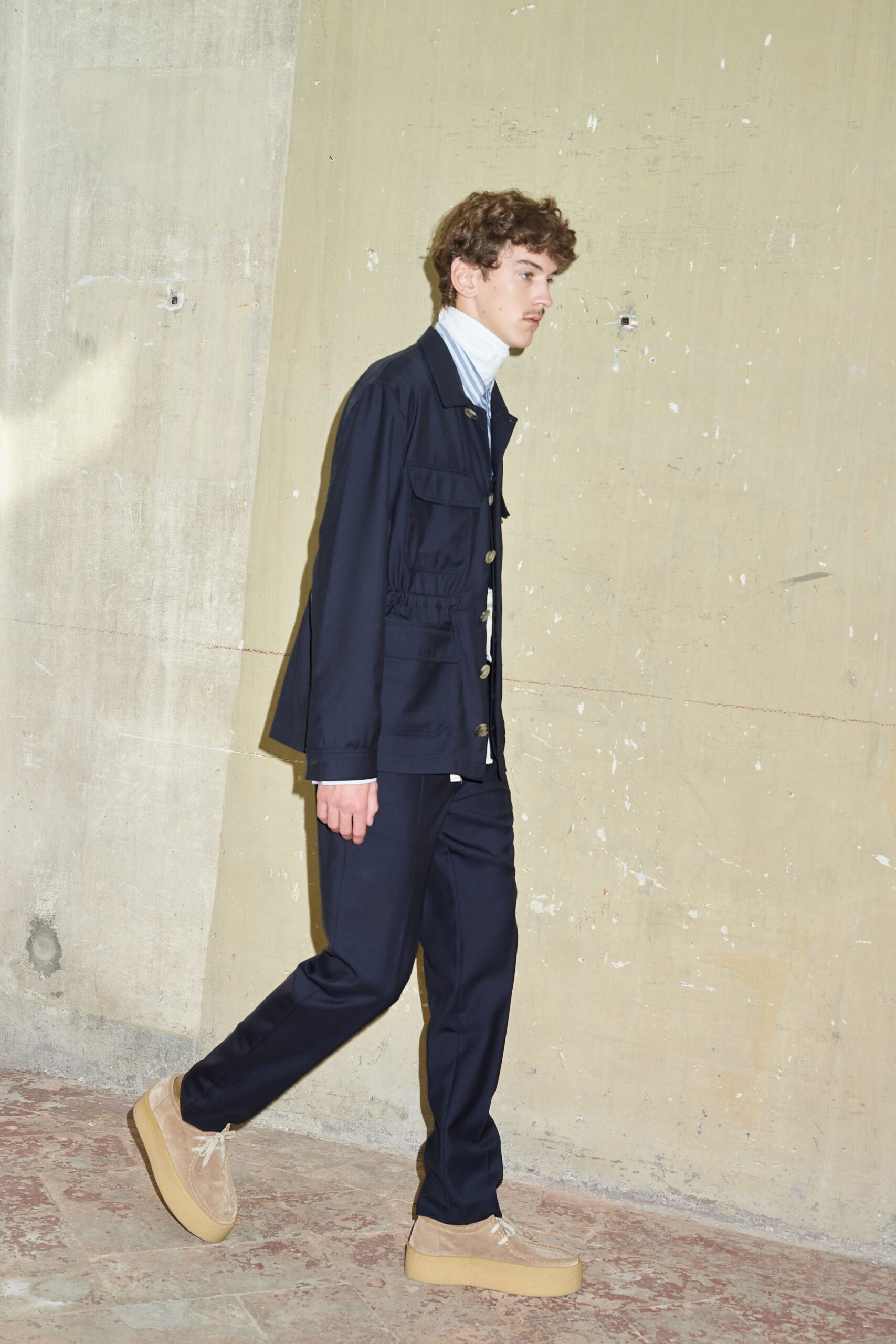 navy cotton jacket with tailored pants