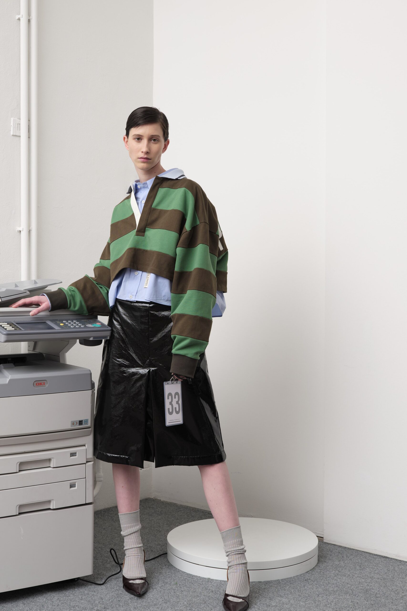 oversized striped top and vinyl pants