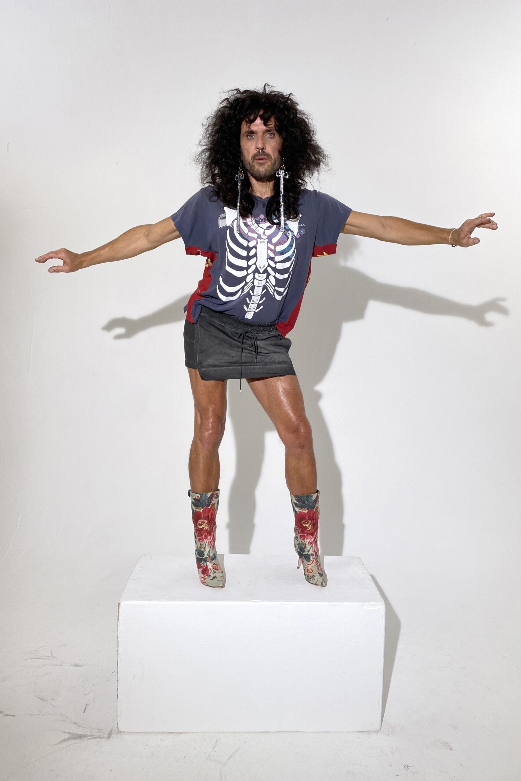 gray printed t-shirt with black leather skirt