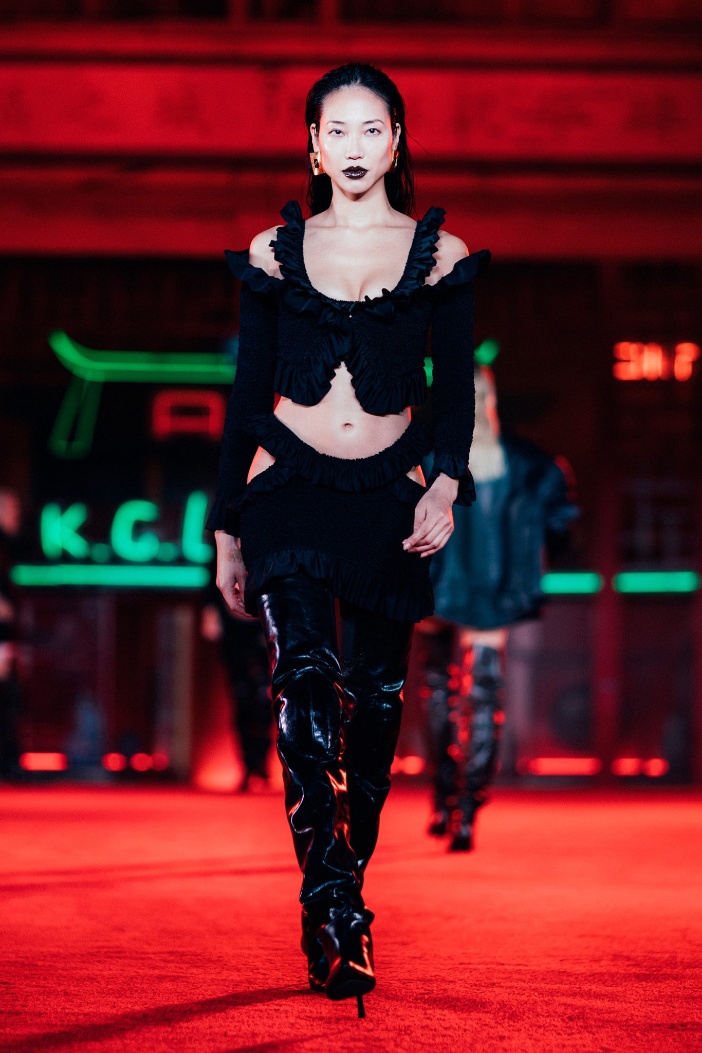 black knit sleeveless off-shoulder fitted ruffled top