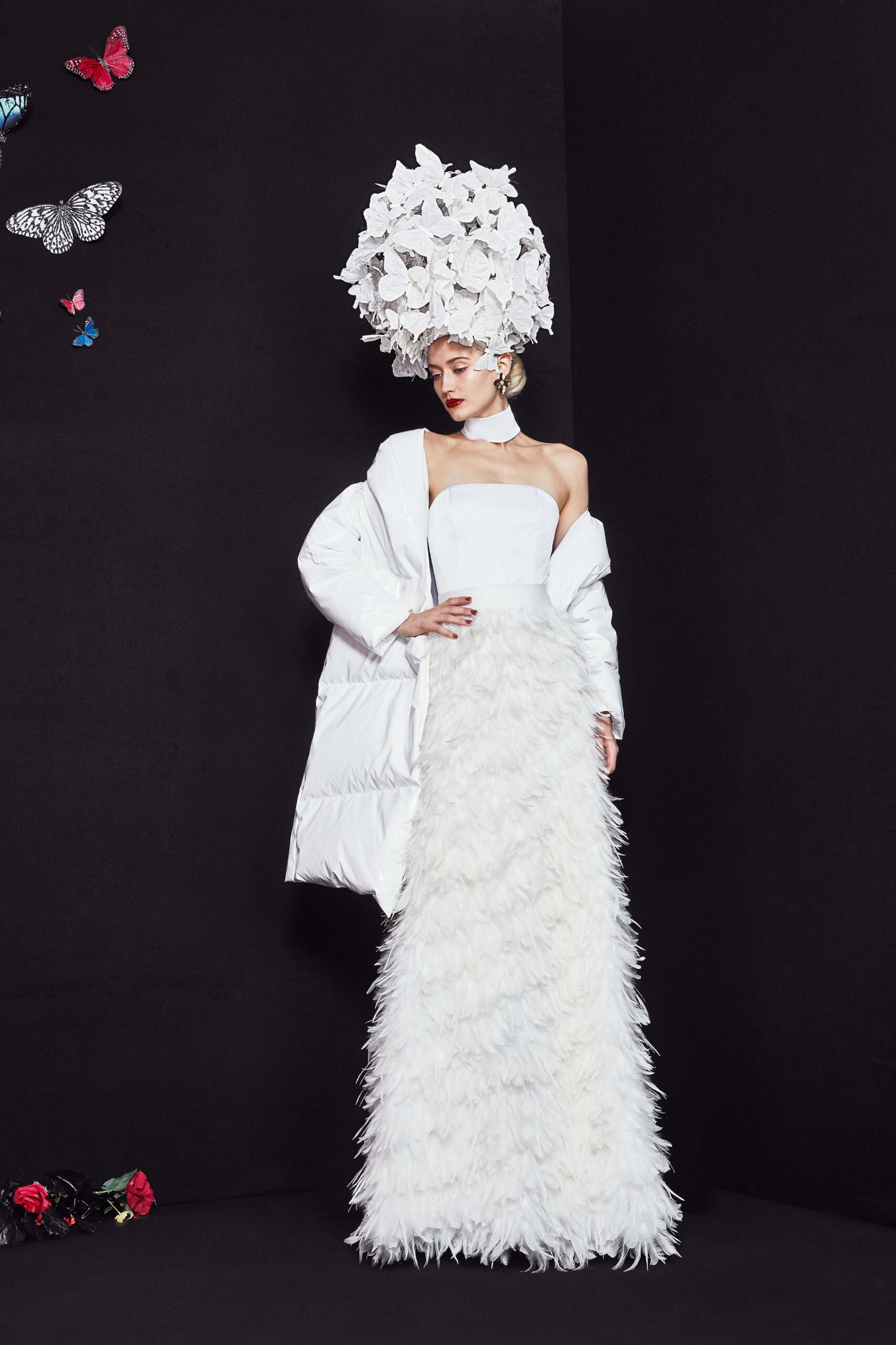 white feathered gown with oversized coat