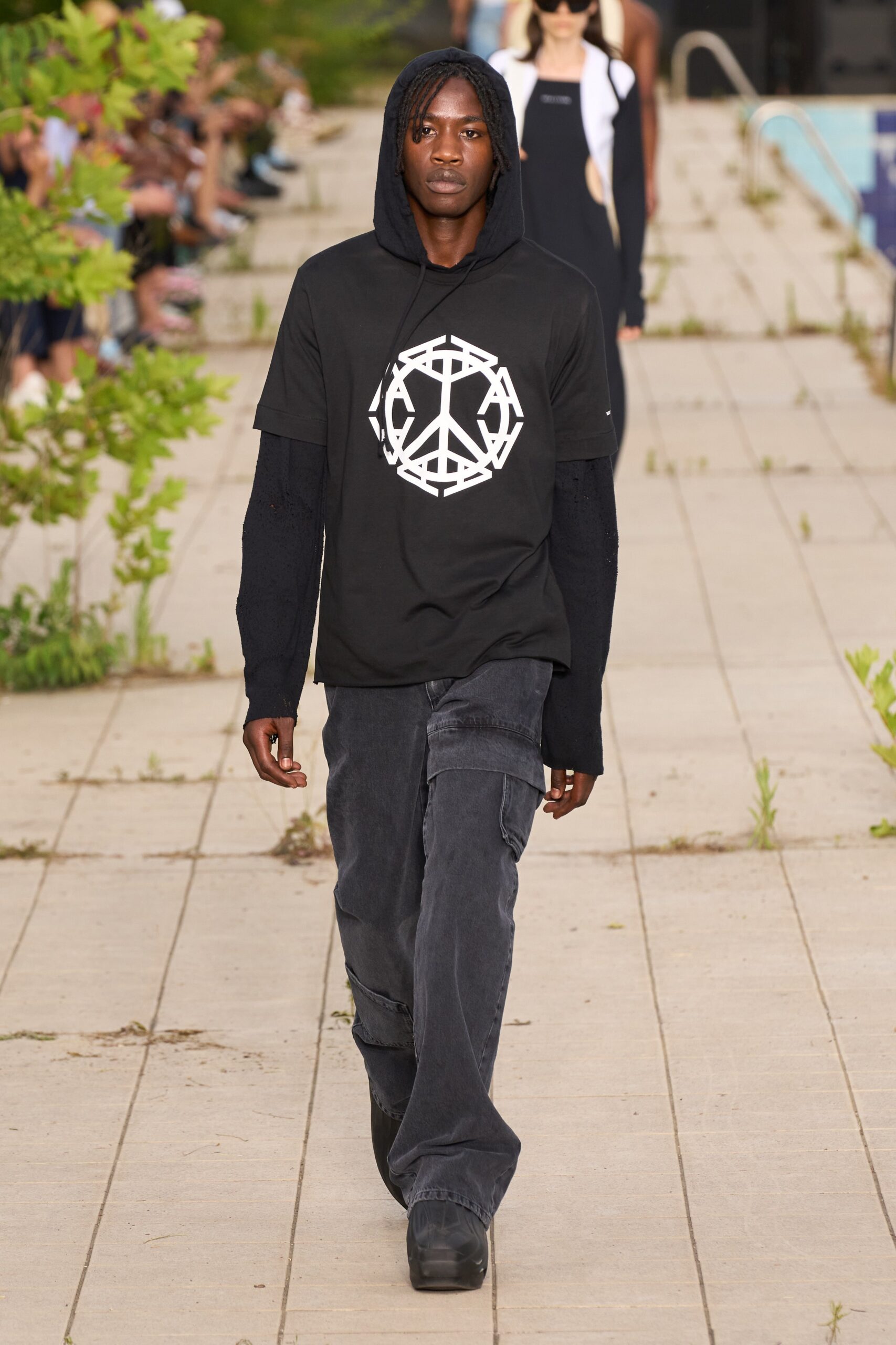 black hoodie and cargo pants