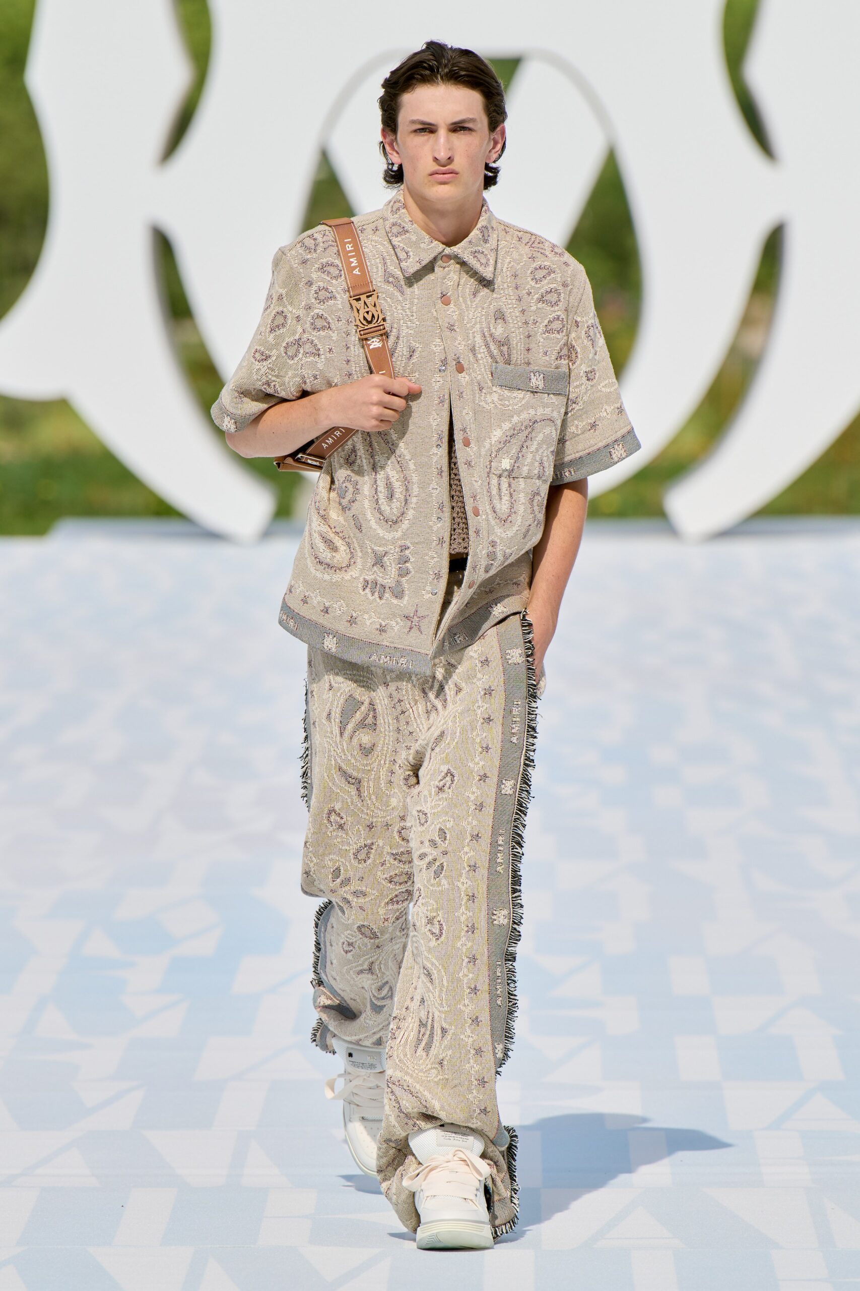 beige embroidered shirt and pants