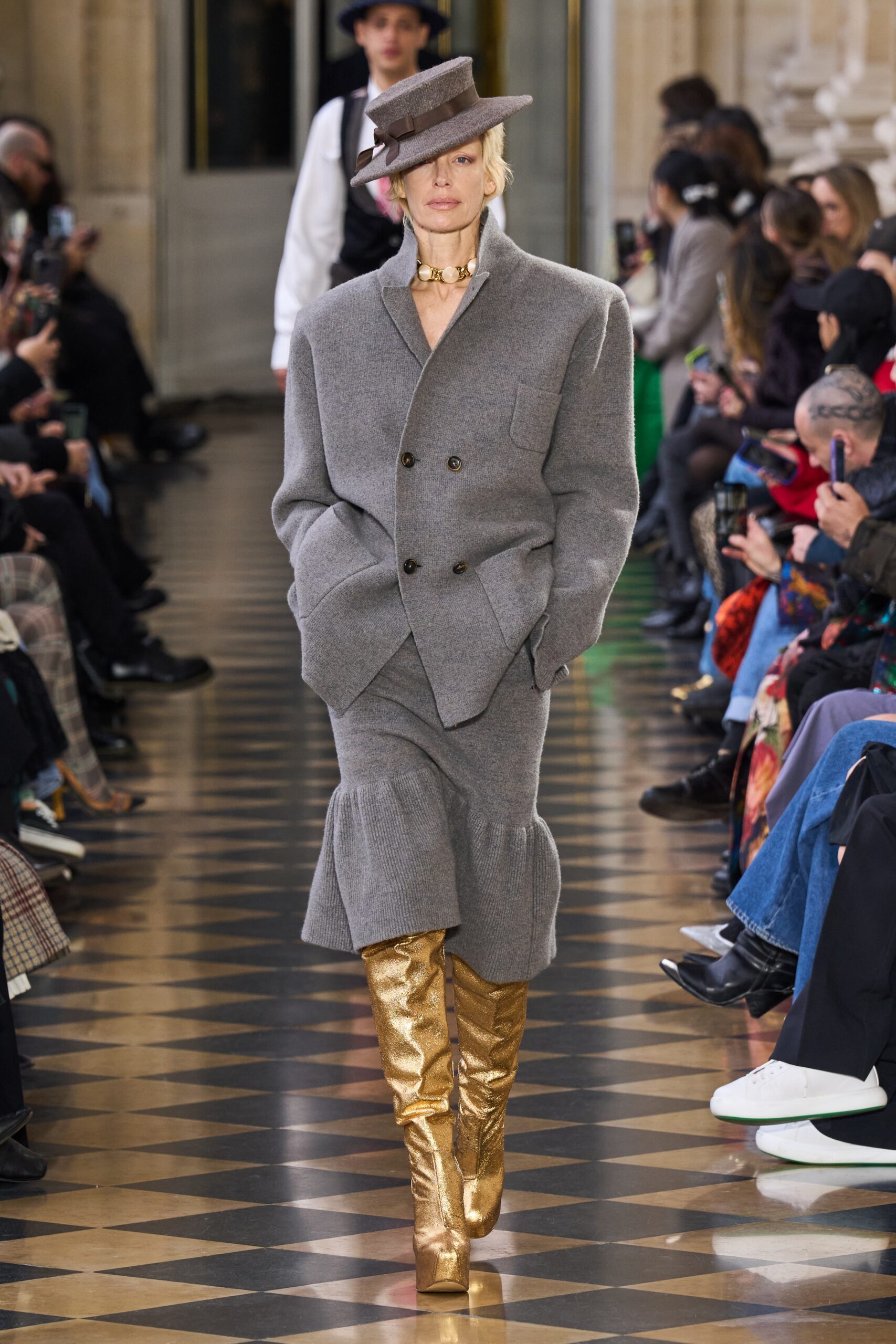 gray wool fitted coat with gold boots