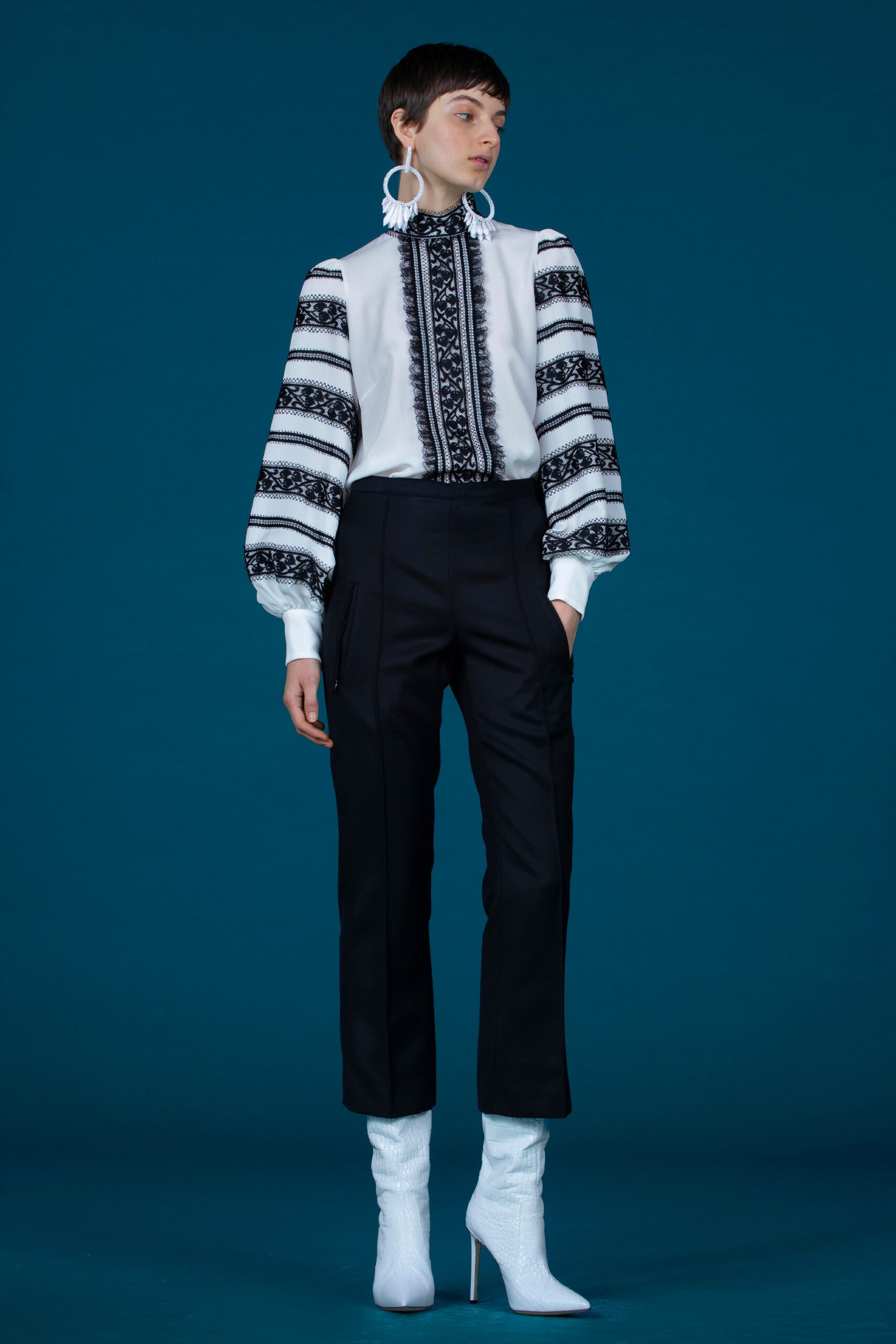 white embroidered blouse with black pants