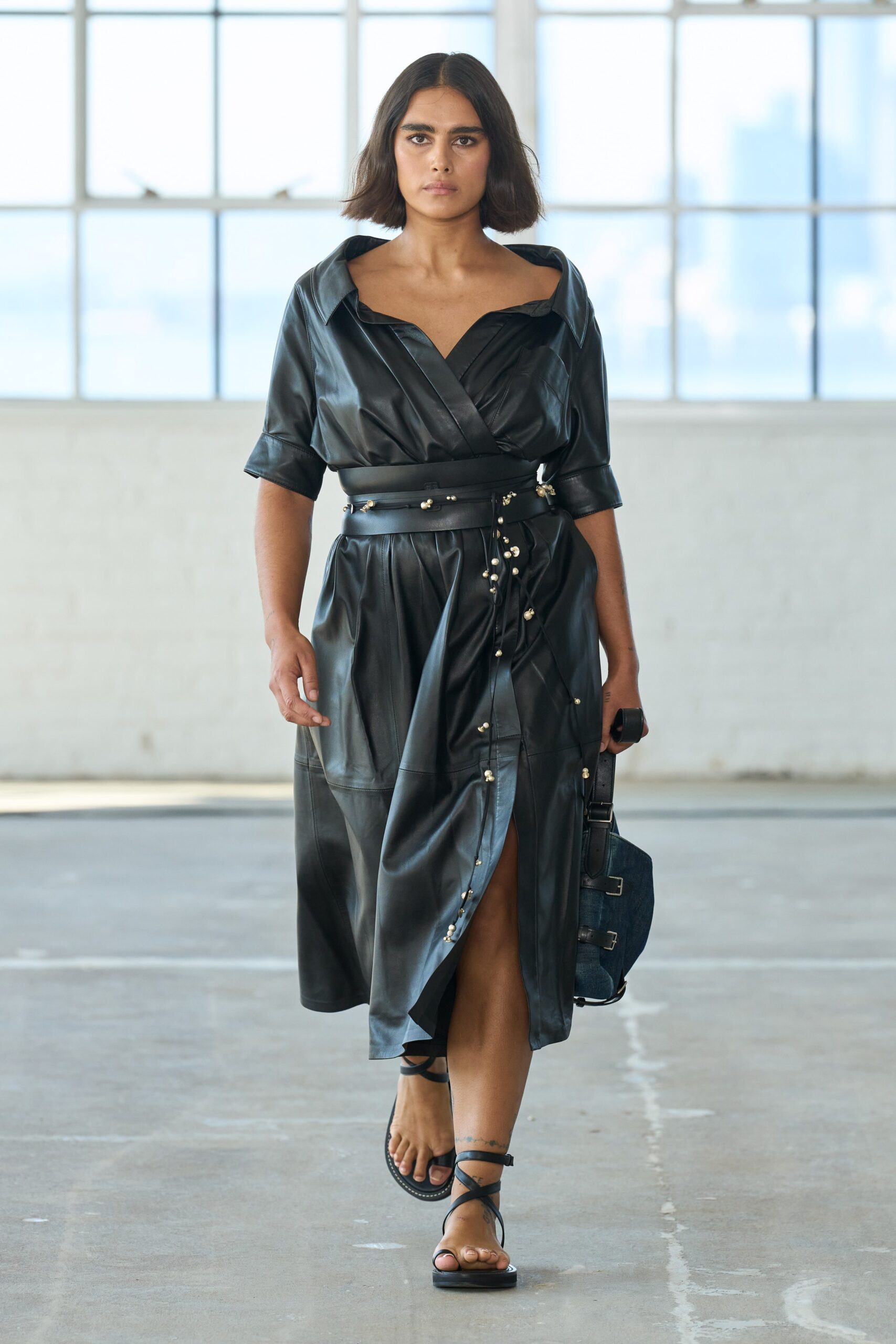 black leather short-sleeve v-neck fitted buttoned belted dress