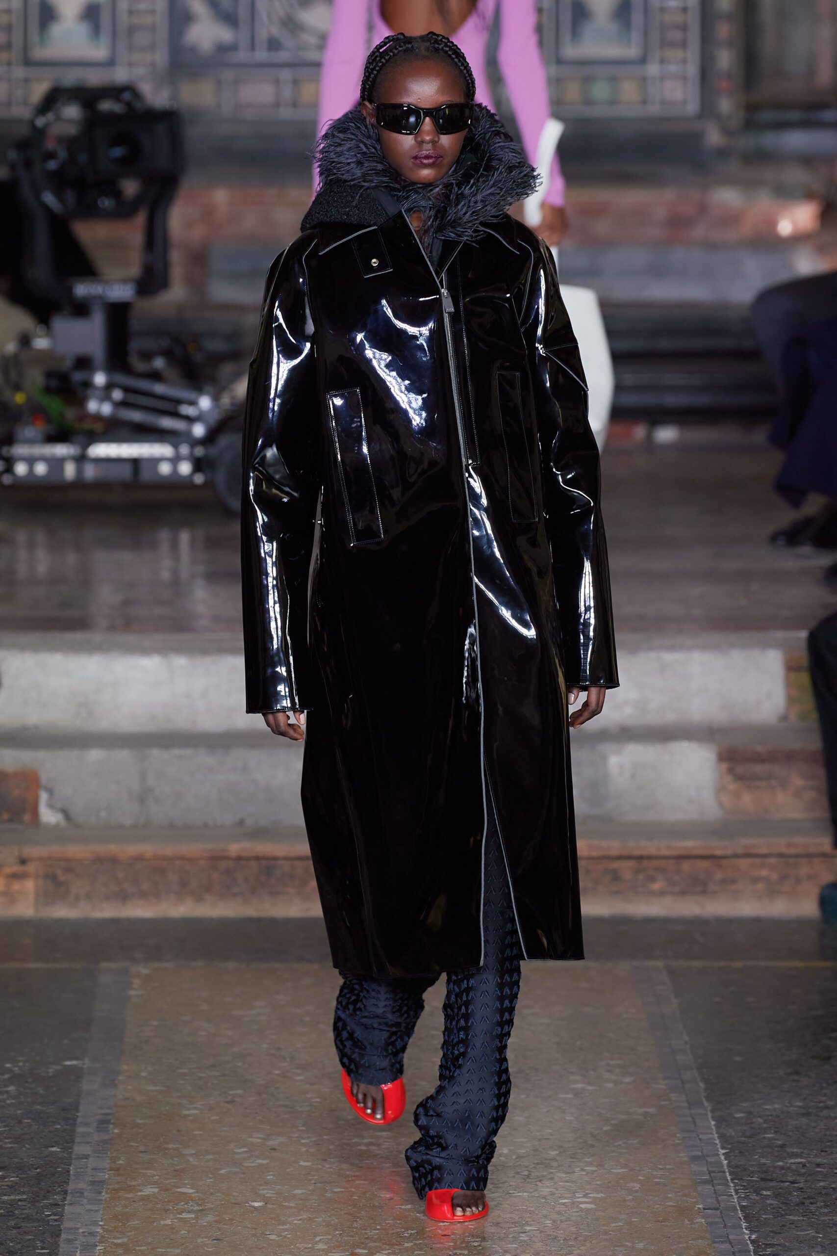 black vinyl long-sleeve collared fitted zippered shiny coat