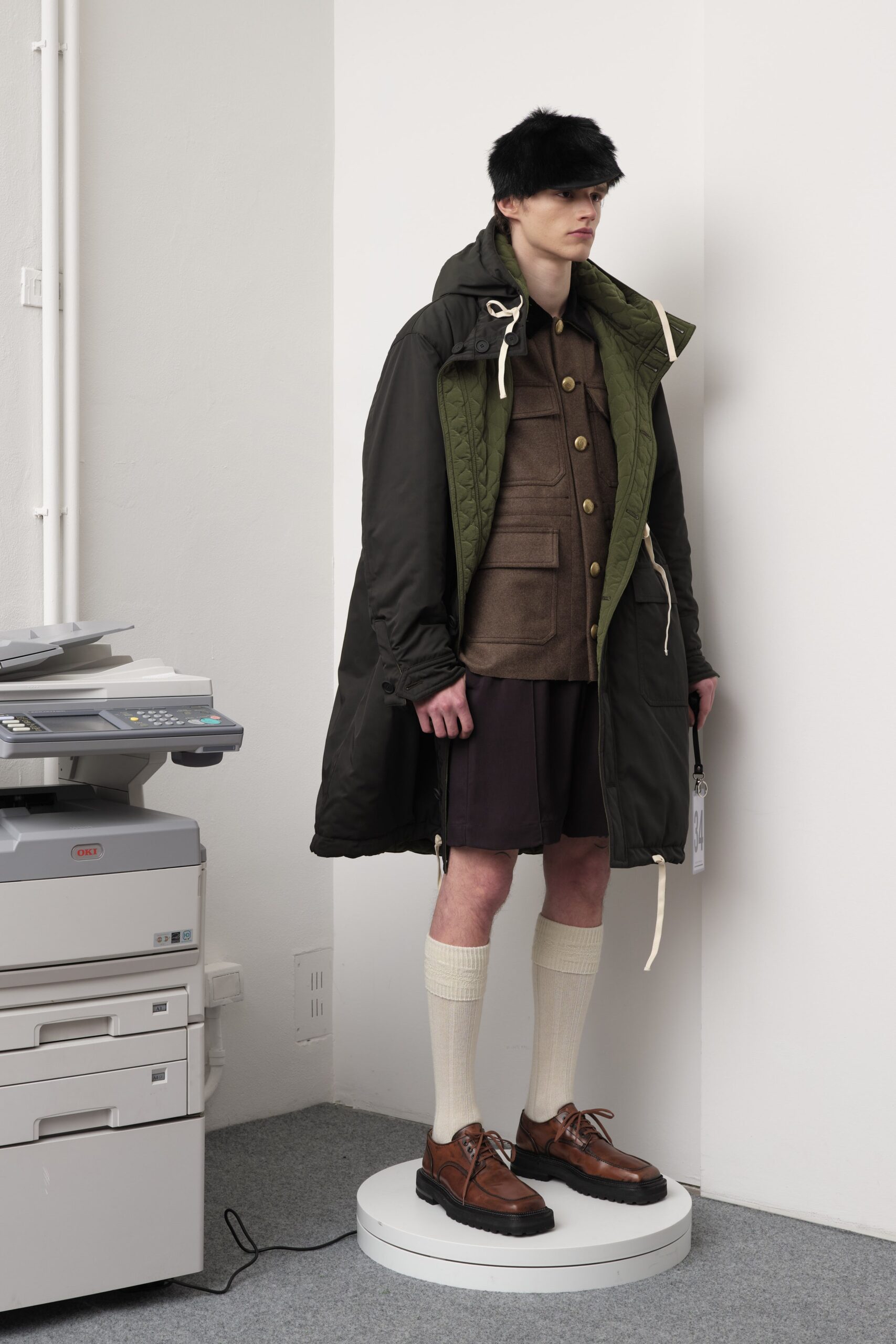 black green relaxed coat with brown shirt