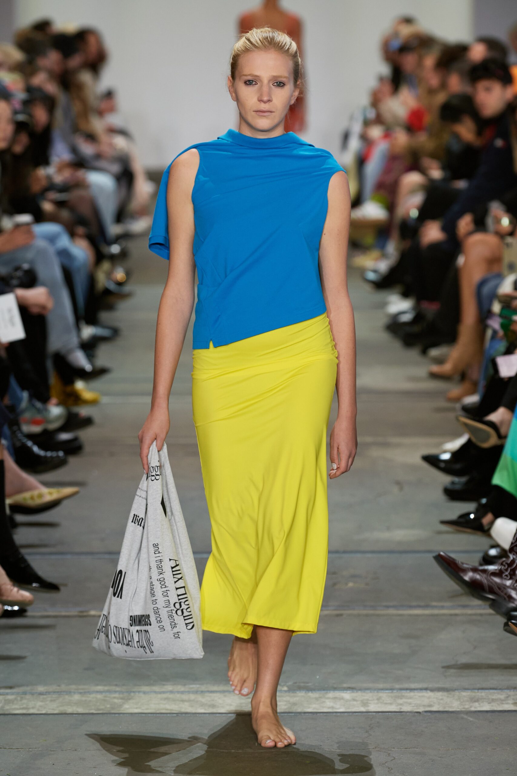 blue fitted top and yellow midi skirt
