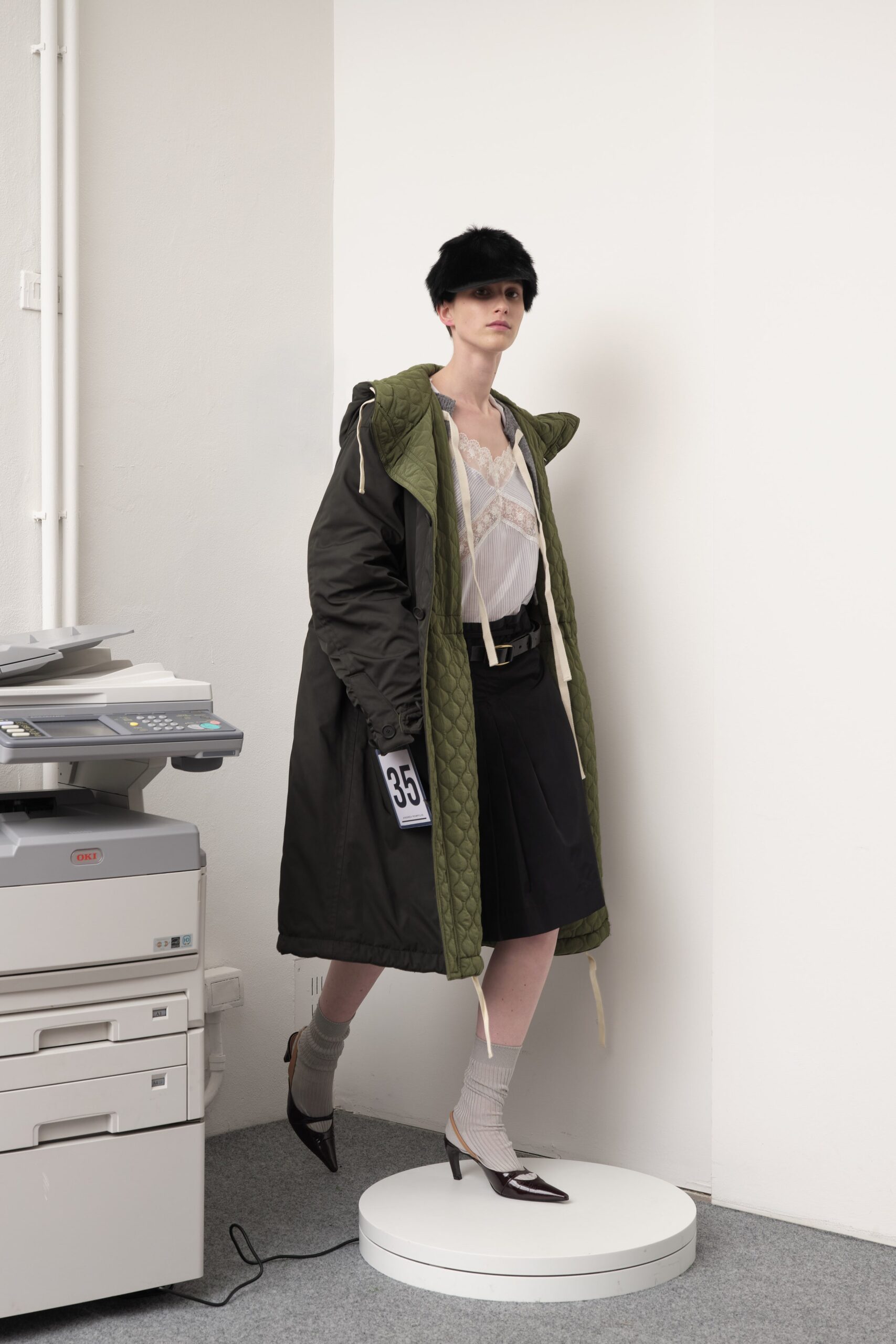 green parka with lace blouse