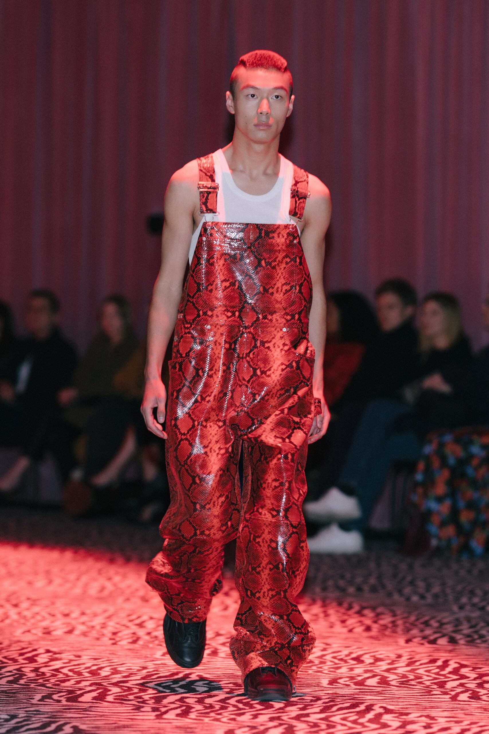 red vinyl sleeveless relaxed printed shiny overalls