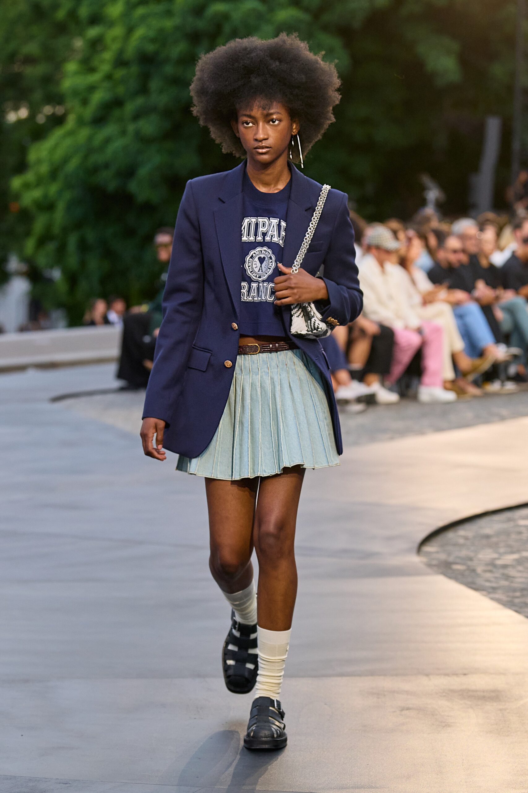 navy blazer with pleated skirt